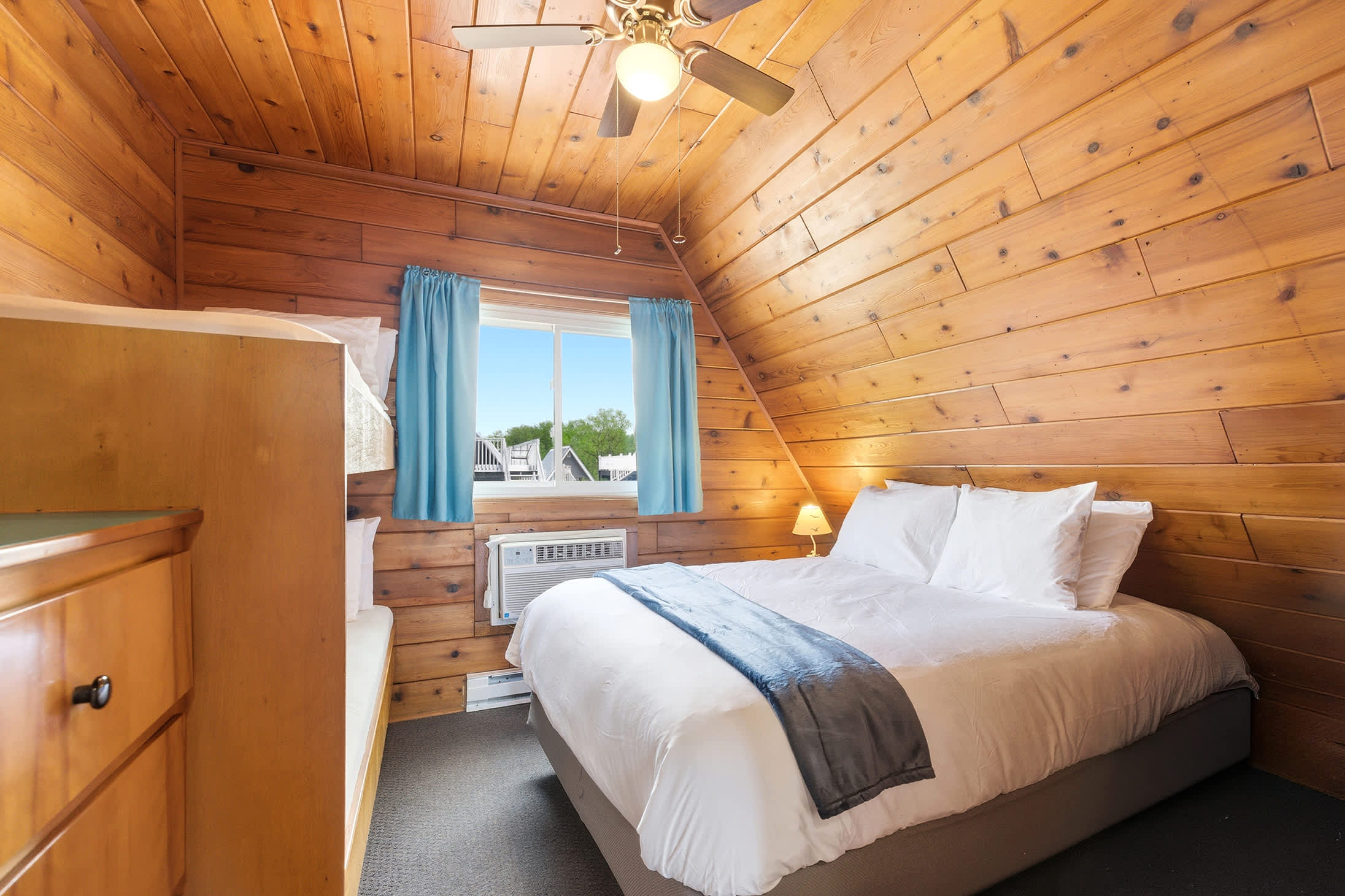 Bedroom 1 is located on the 2nd floor and has a queen and single bunk bed.