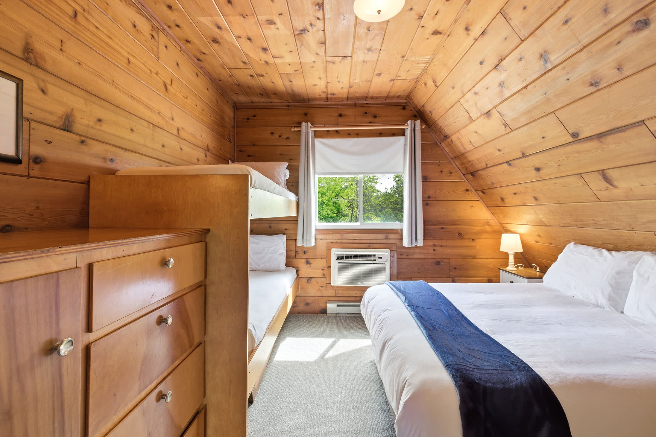 Bedroom 1 is on the 2nd floor and has a queen and single bunk bed.