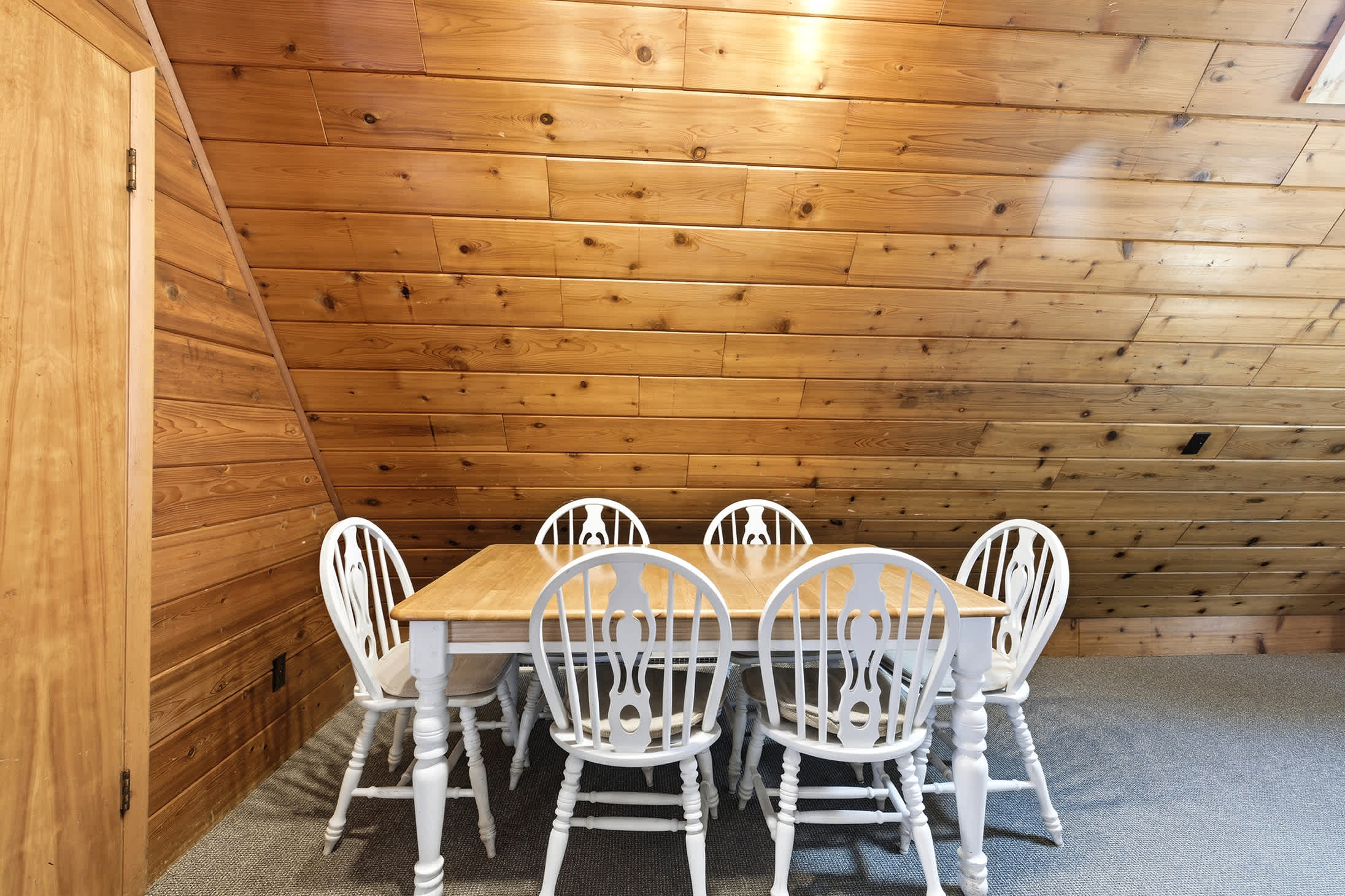 Gather everyone around the table after long days at the lakeside resort.