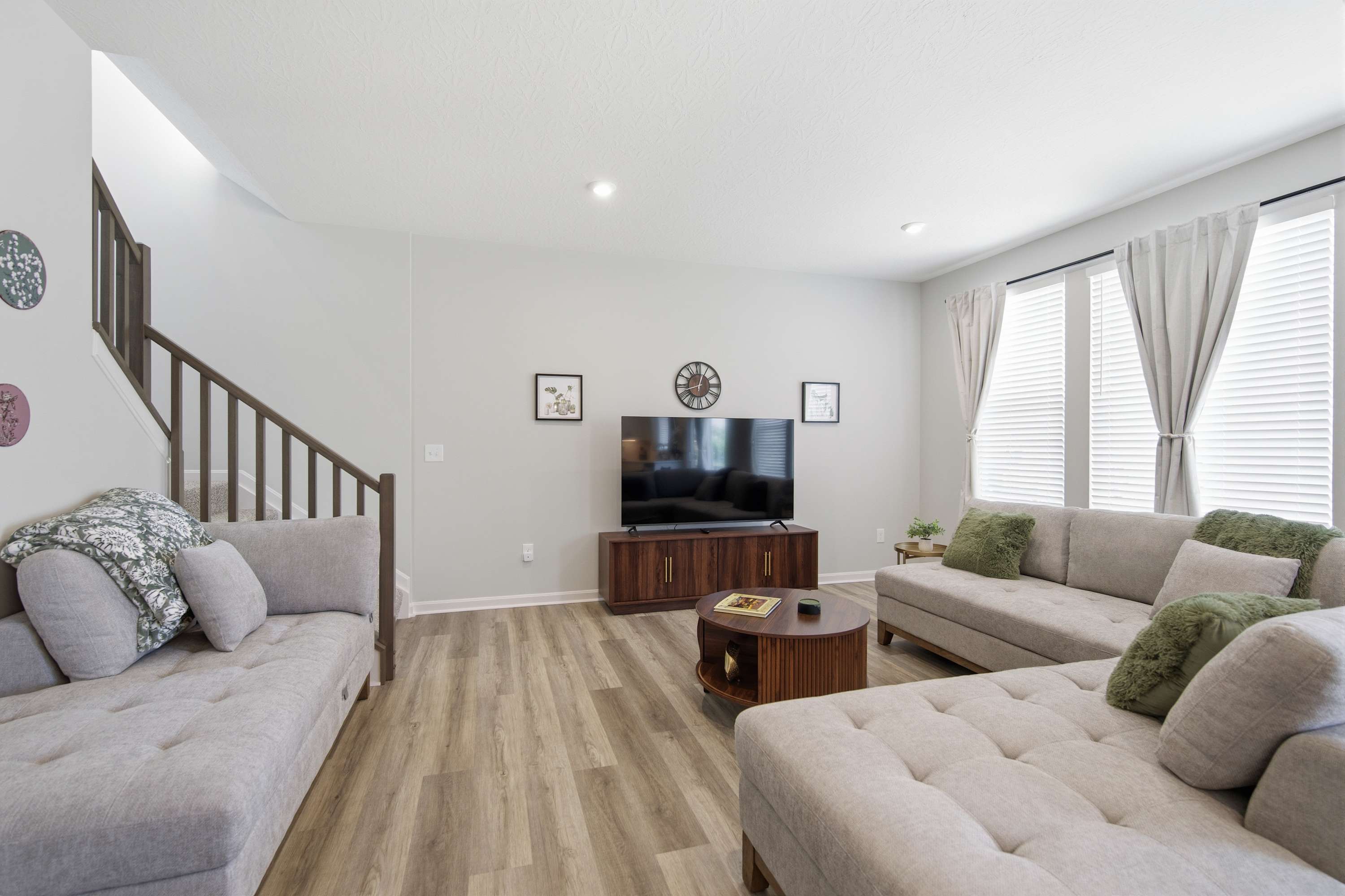 Unwind in the serene living room & stream your favorites on the smart TV​