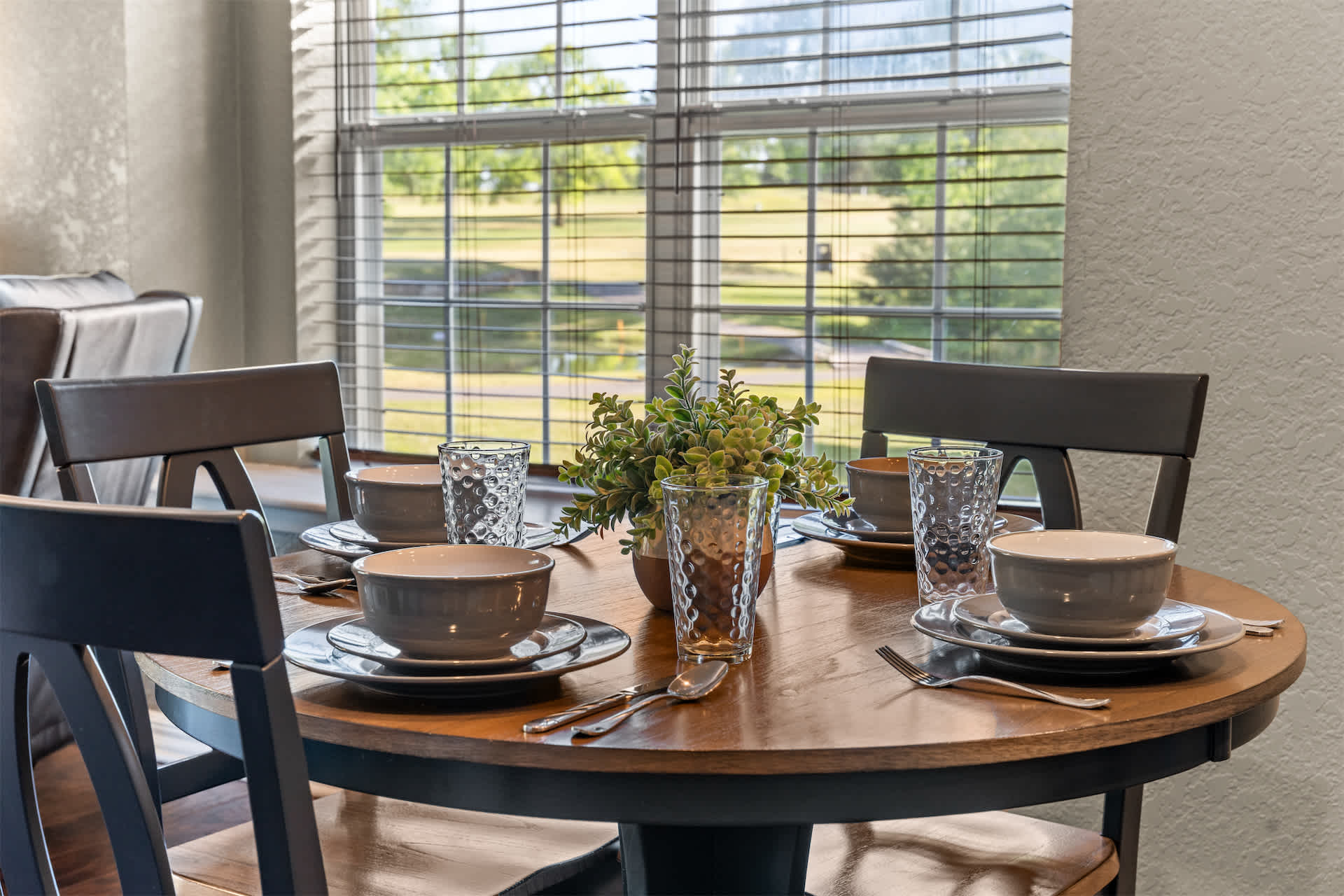 Make mealtime memories together at the dining table, seating 4​