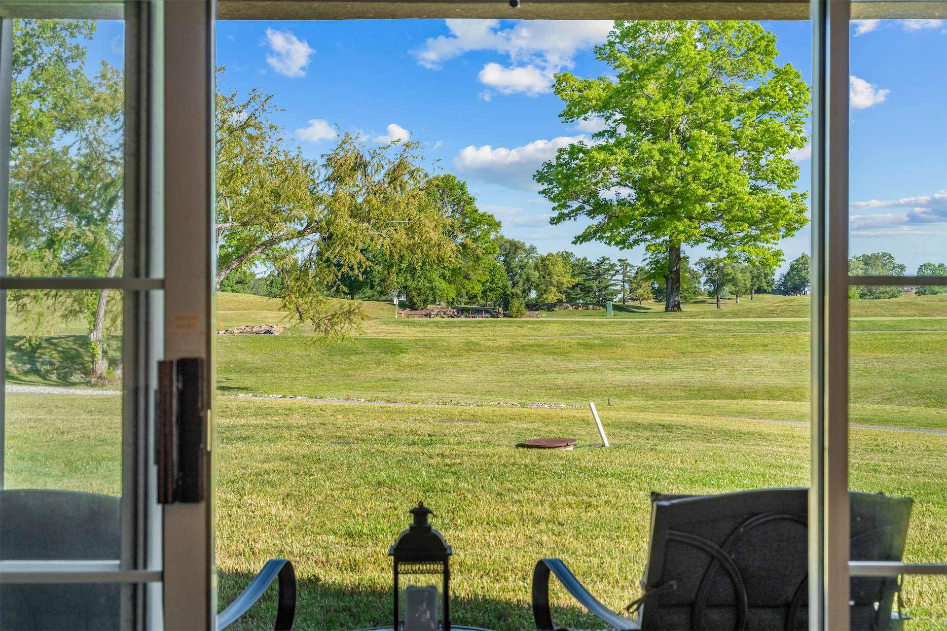 Sip morning coffee or an evening cocktail with golf course views on the patio​