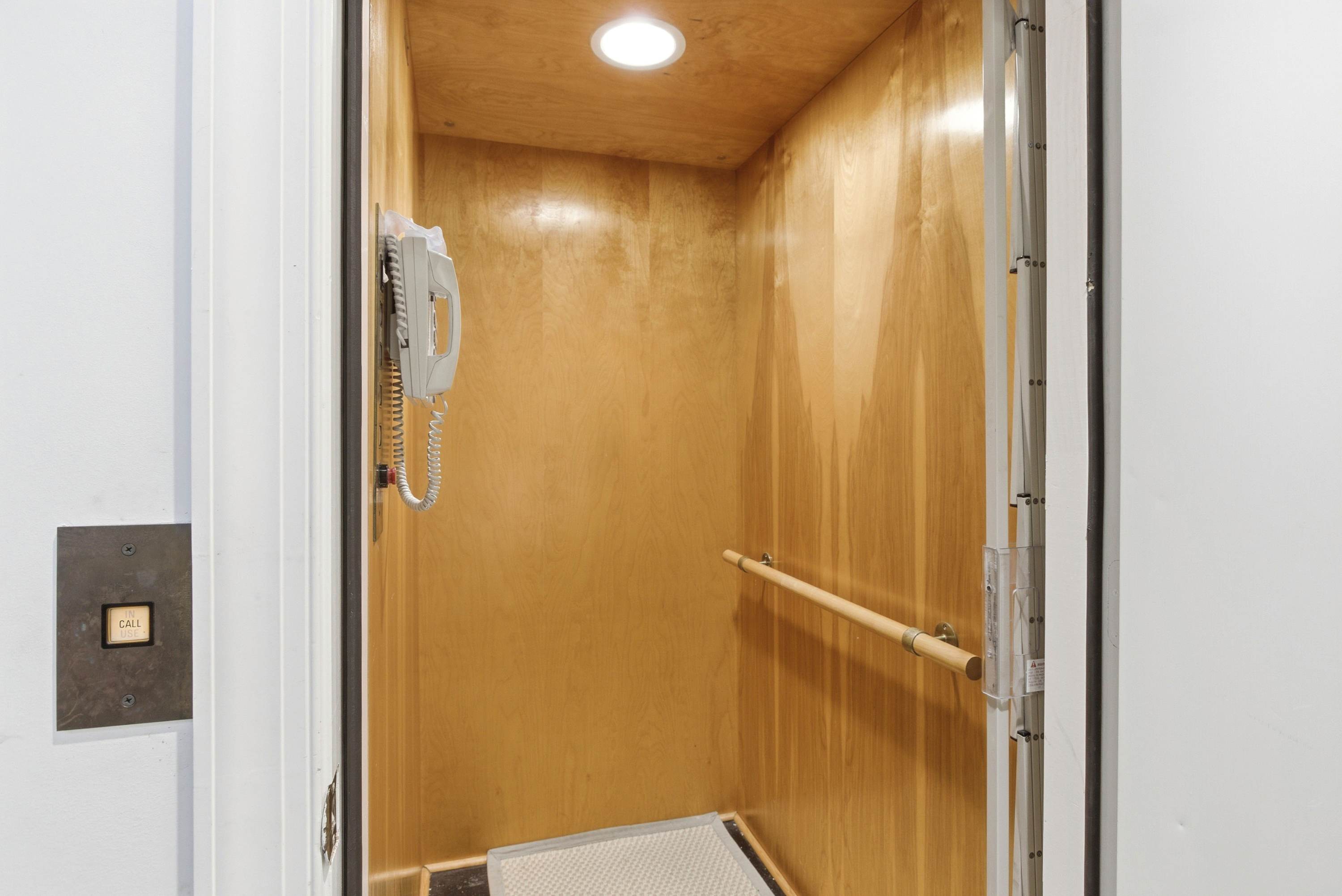 A private in-home elevator serves all floors, making luggage, groceries, and accessibility completely effortless.