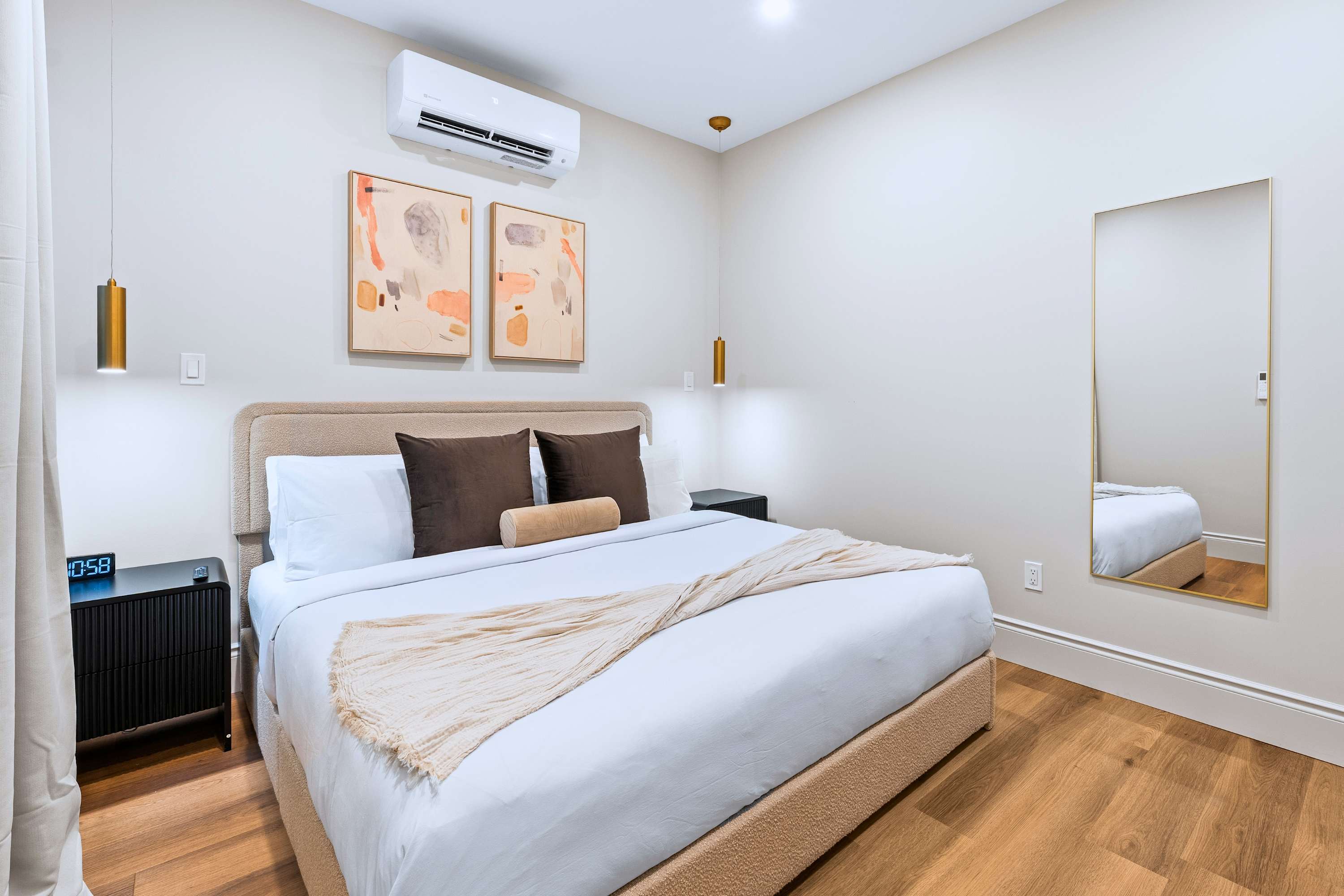 King bedroom with a beautifully styled bed for rest and comfort