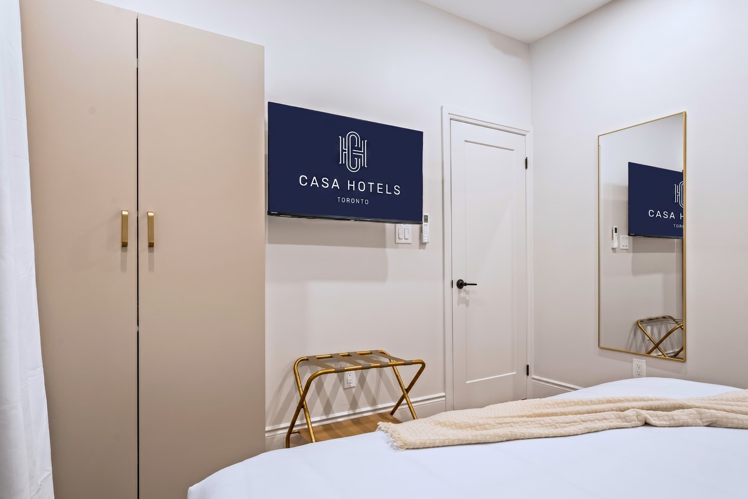 King bedroom designed for comfort, with thoughtful touches for a relaxed, elevated stay