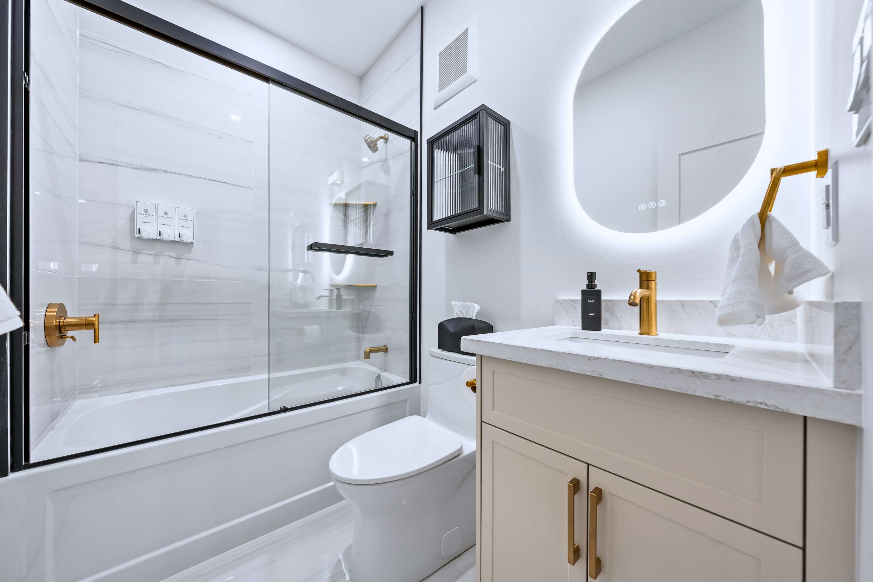 Bathroom with walk in shower and bathtub for a calm, refreshing unwind