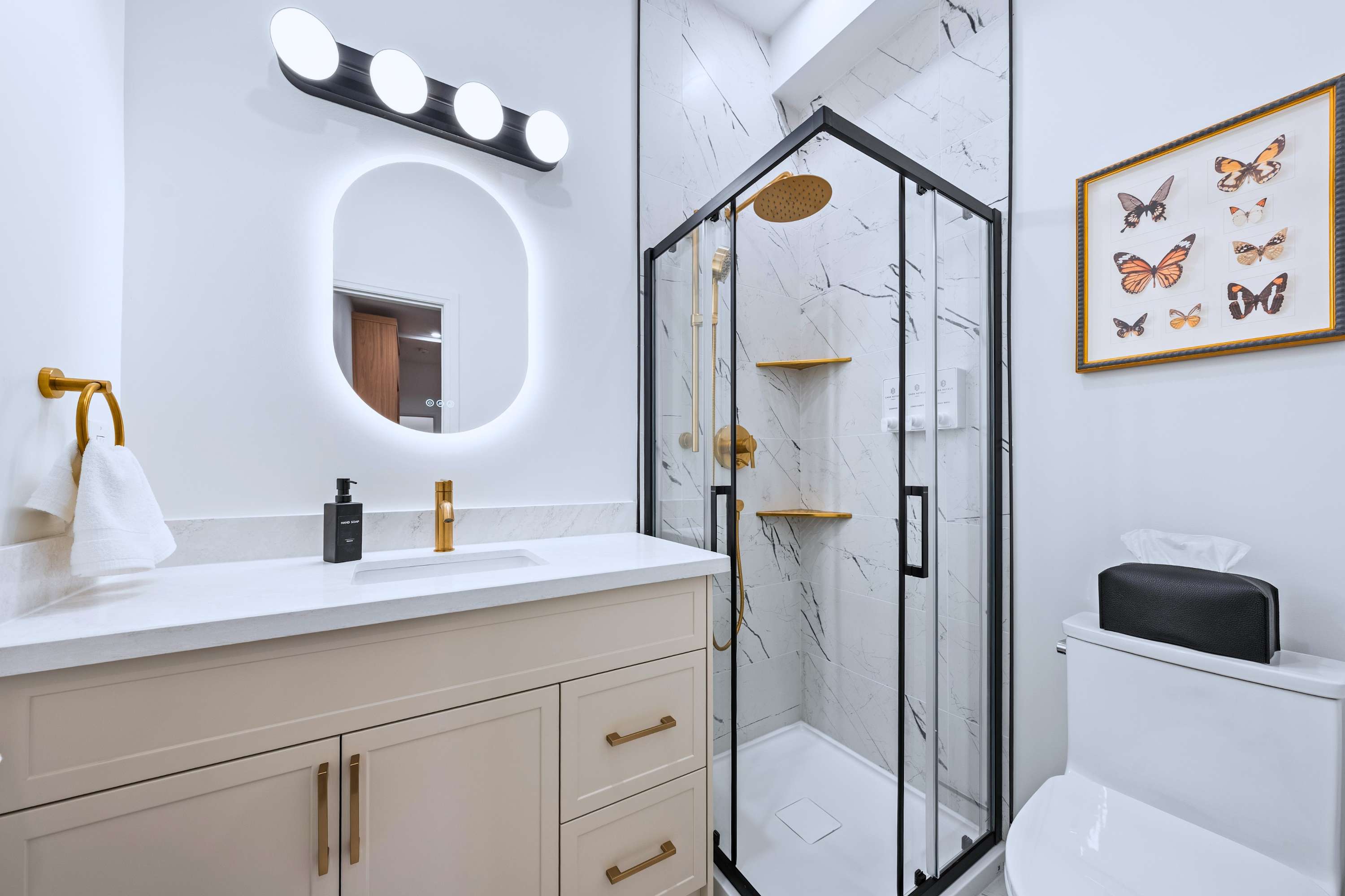 Bathroom with walk in shower and lighted mirror for easy getting ready