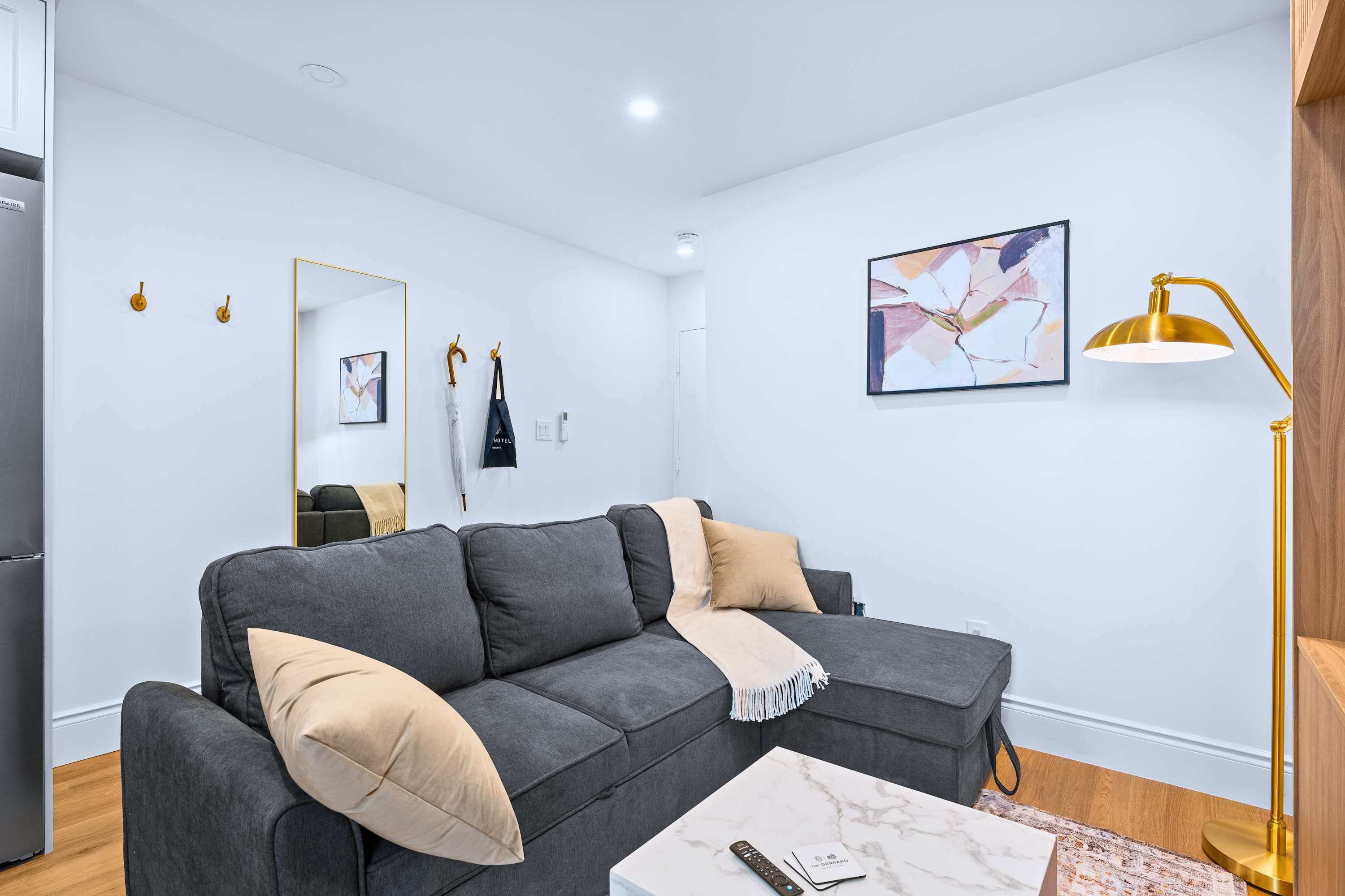 Stylish living space that easily transforms into additional guest sleeping.
