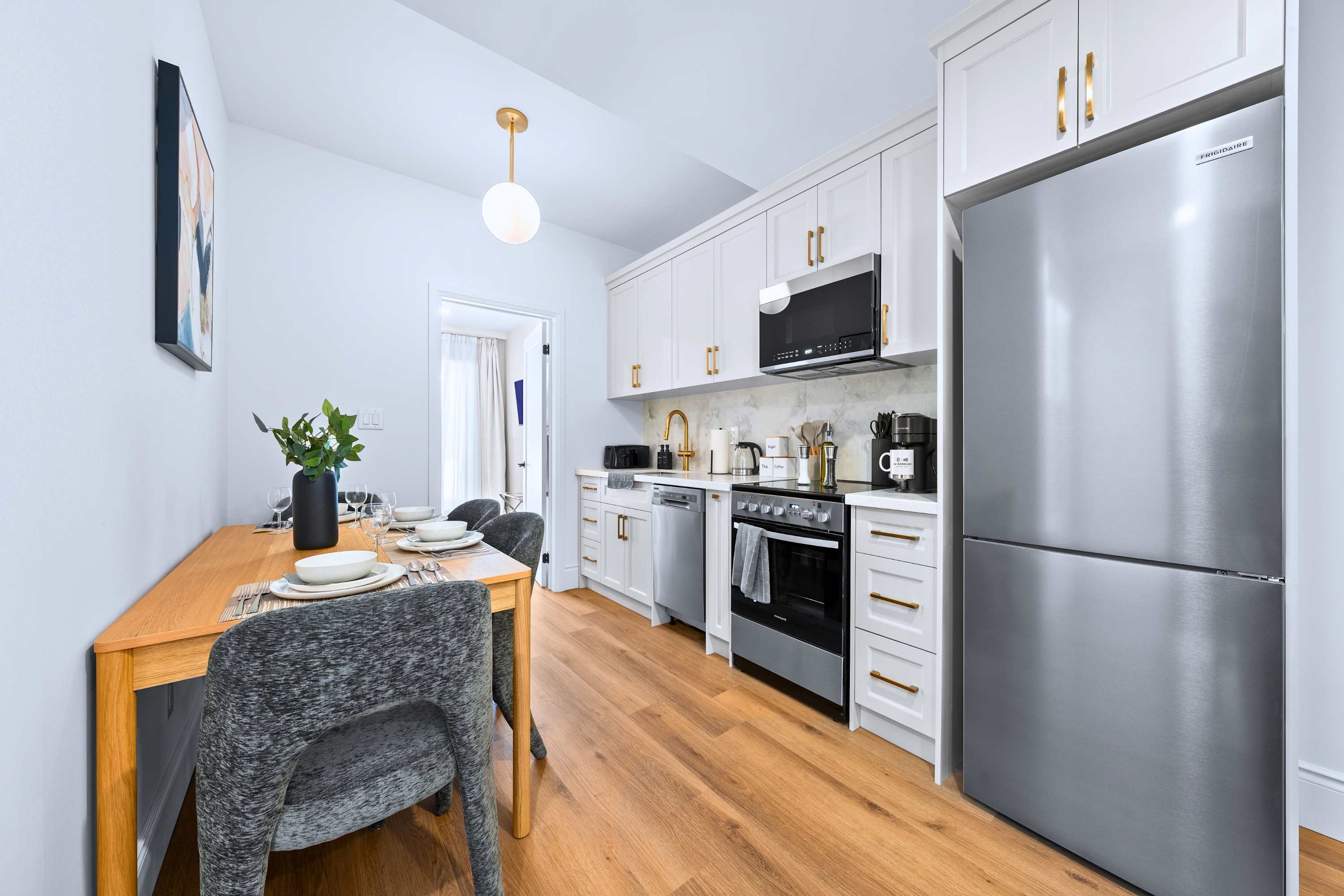 Shared dining and kitchen space for convenience.