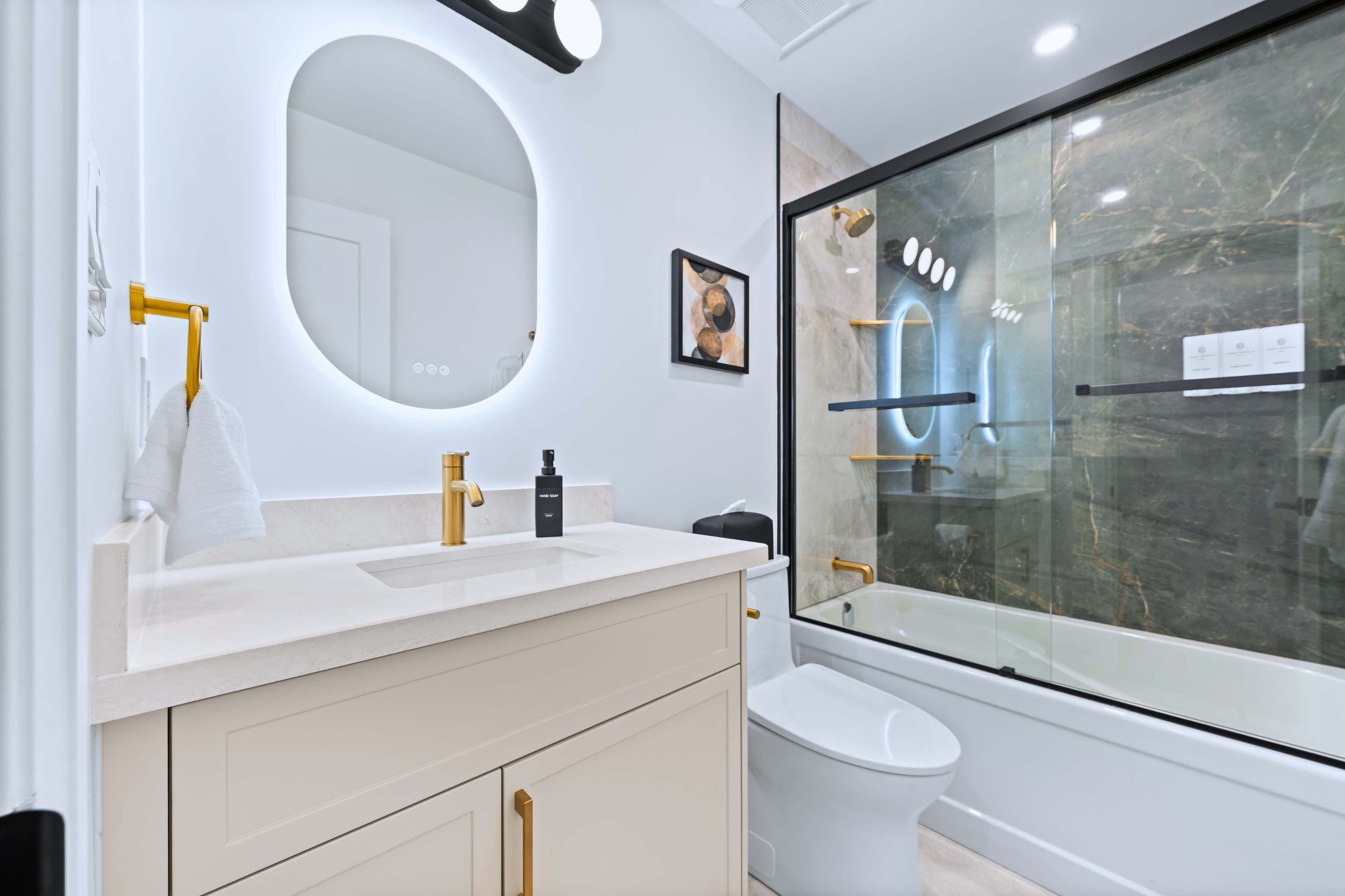 Stylish bathroom with a relaxing walk-in shower and a bathtub experience.