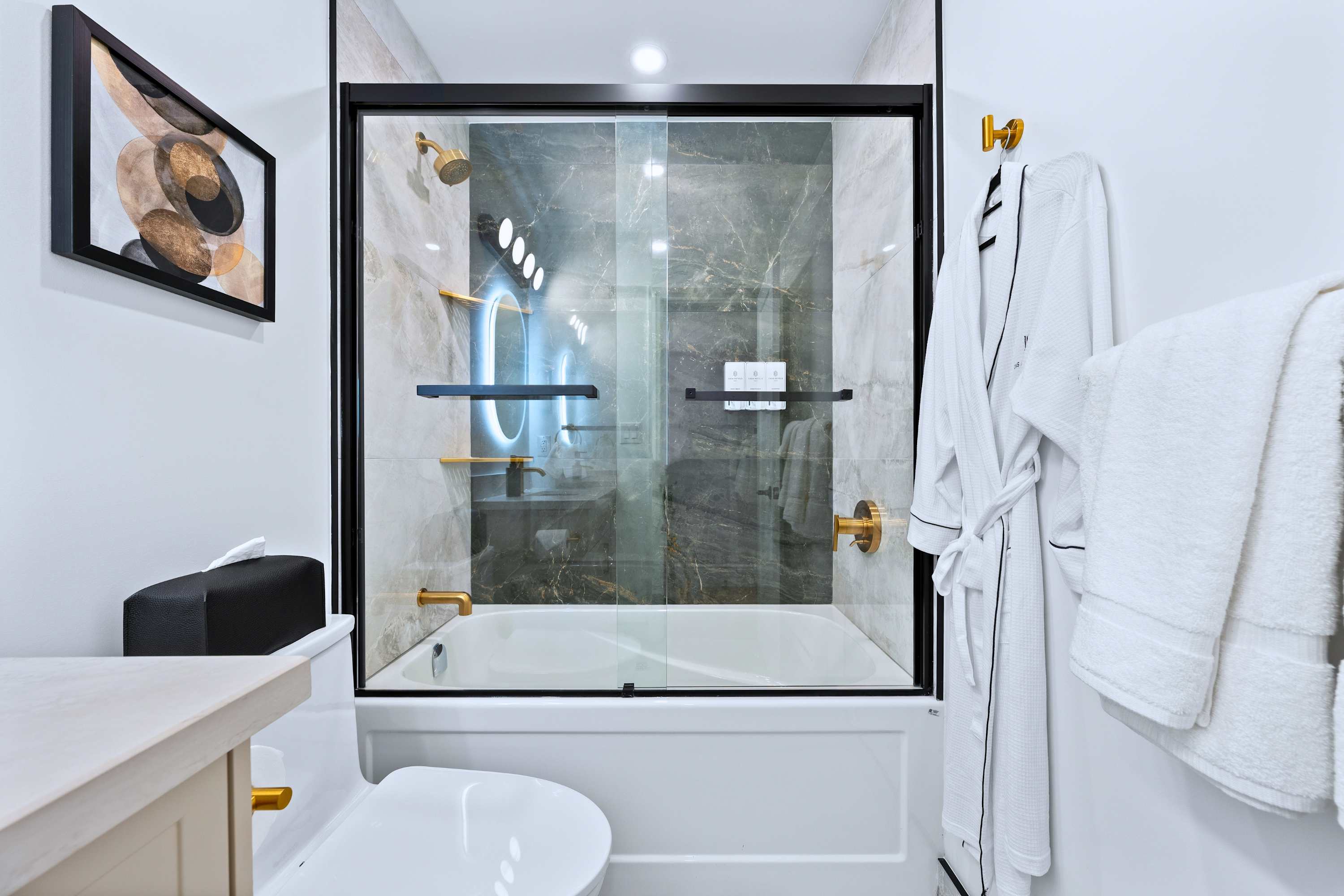 Modern bathroom featuring both a bathtub and a shower for ultimate comfort.