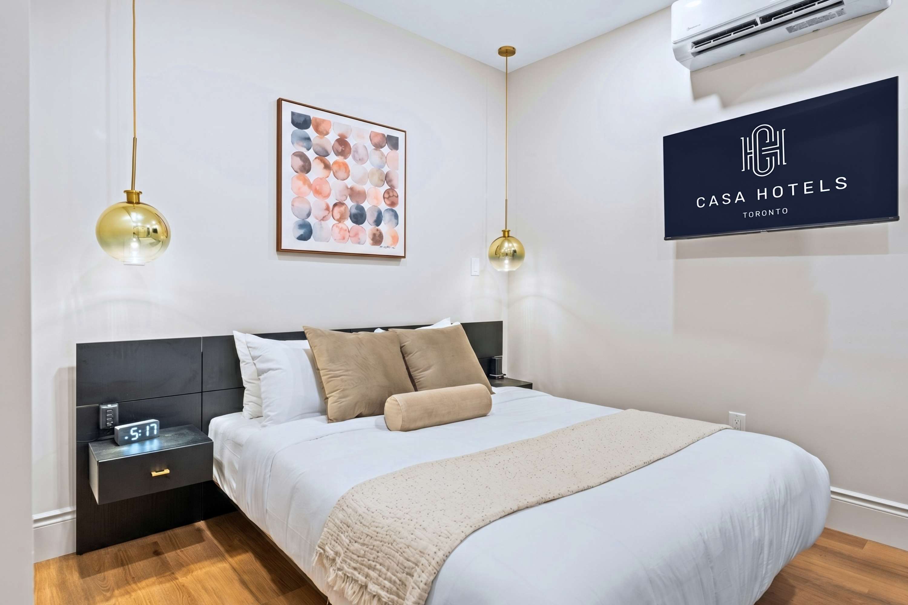 Unwind in this queen sized bedroom with a cozy and inviting setup.