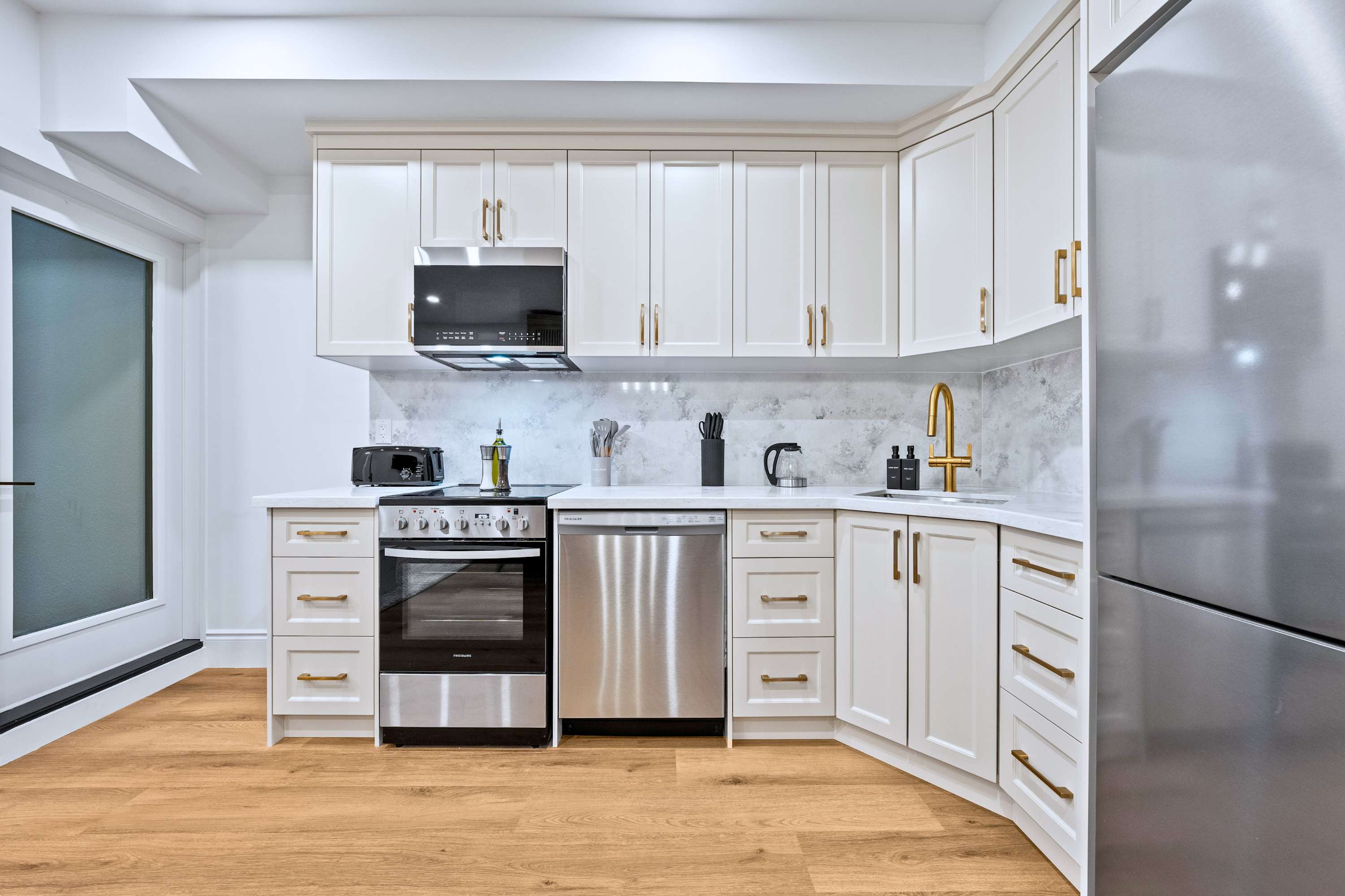 Prepare meals with ease in this functional kitchen space.