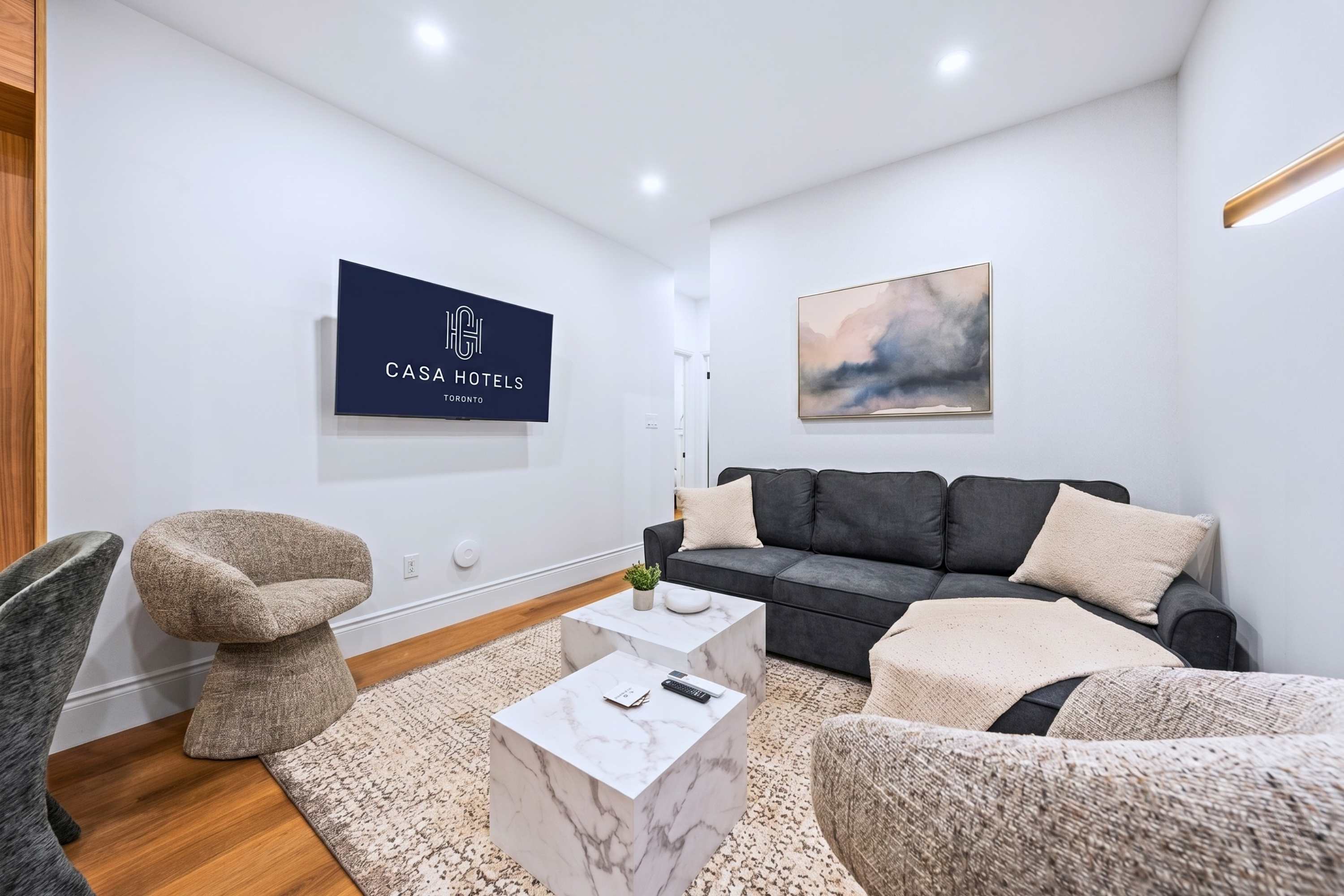 Cozy living space with comfortable seating and a sofa bed.