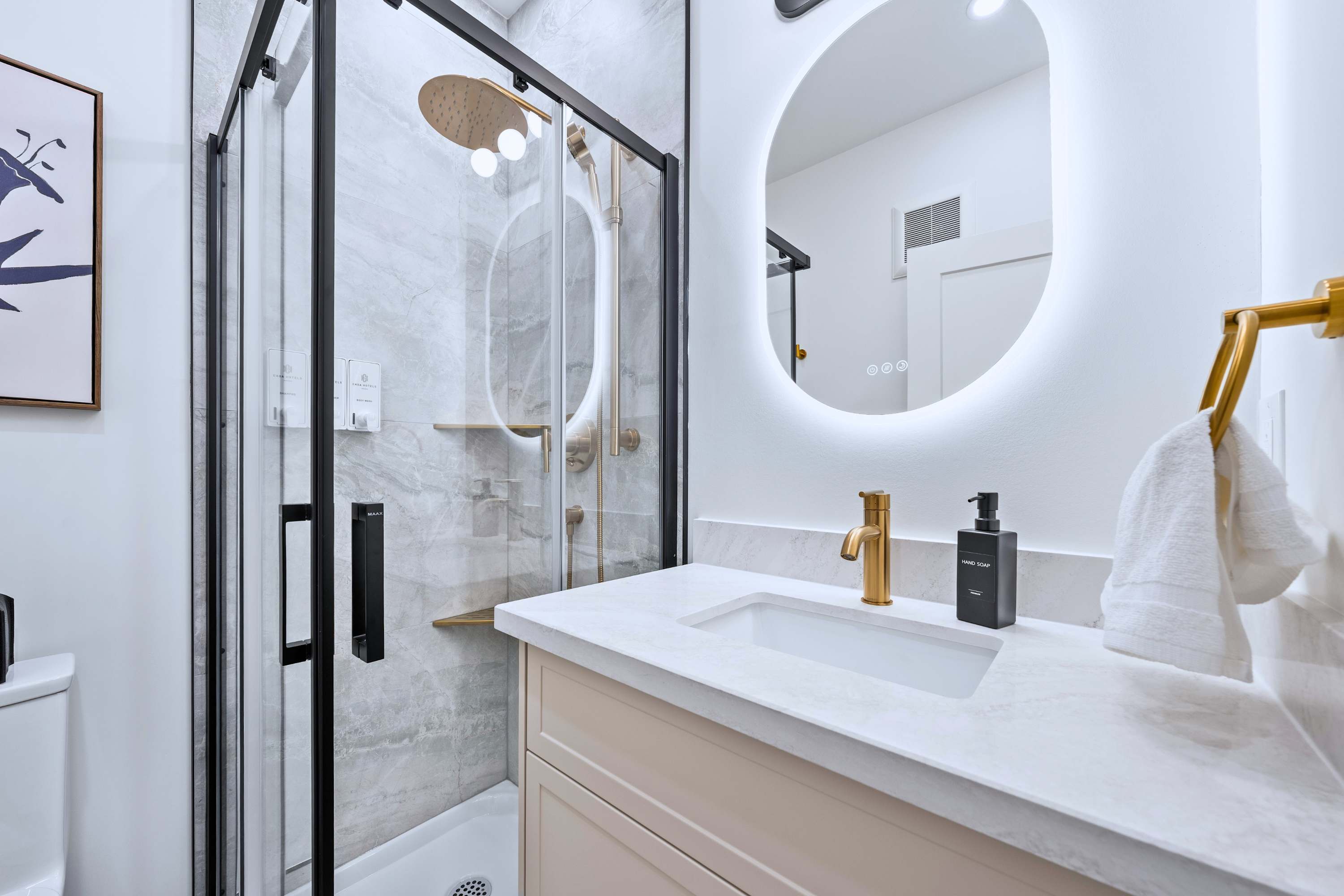 Bright bathroom offering a clean and comfortable space to refresh.