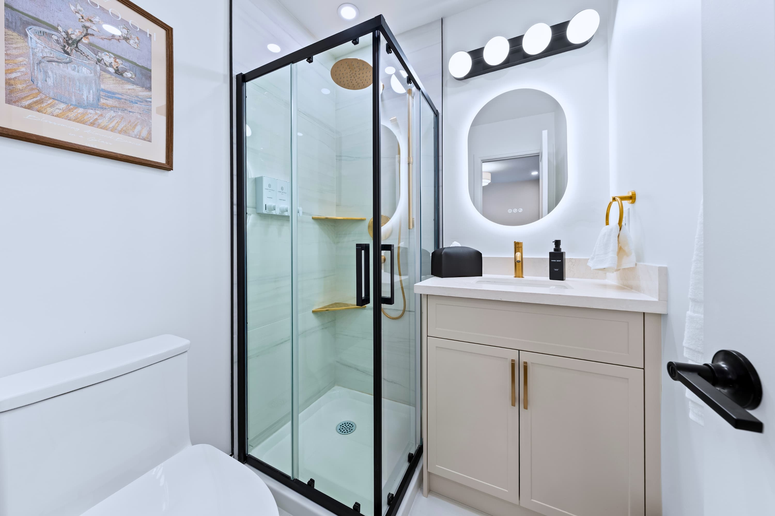 Bathroom with walk in shower and mirror, designed for simple, comfortable daily routines