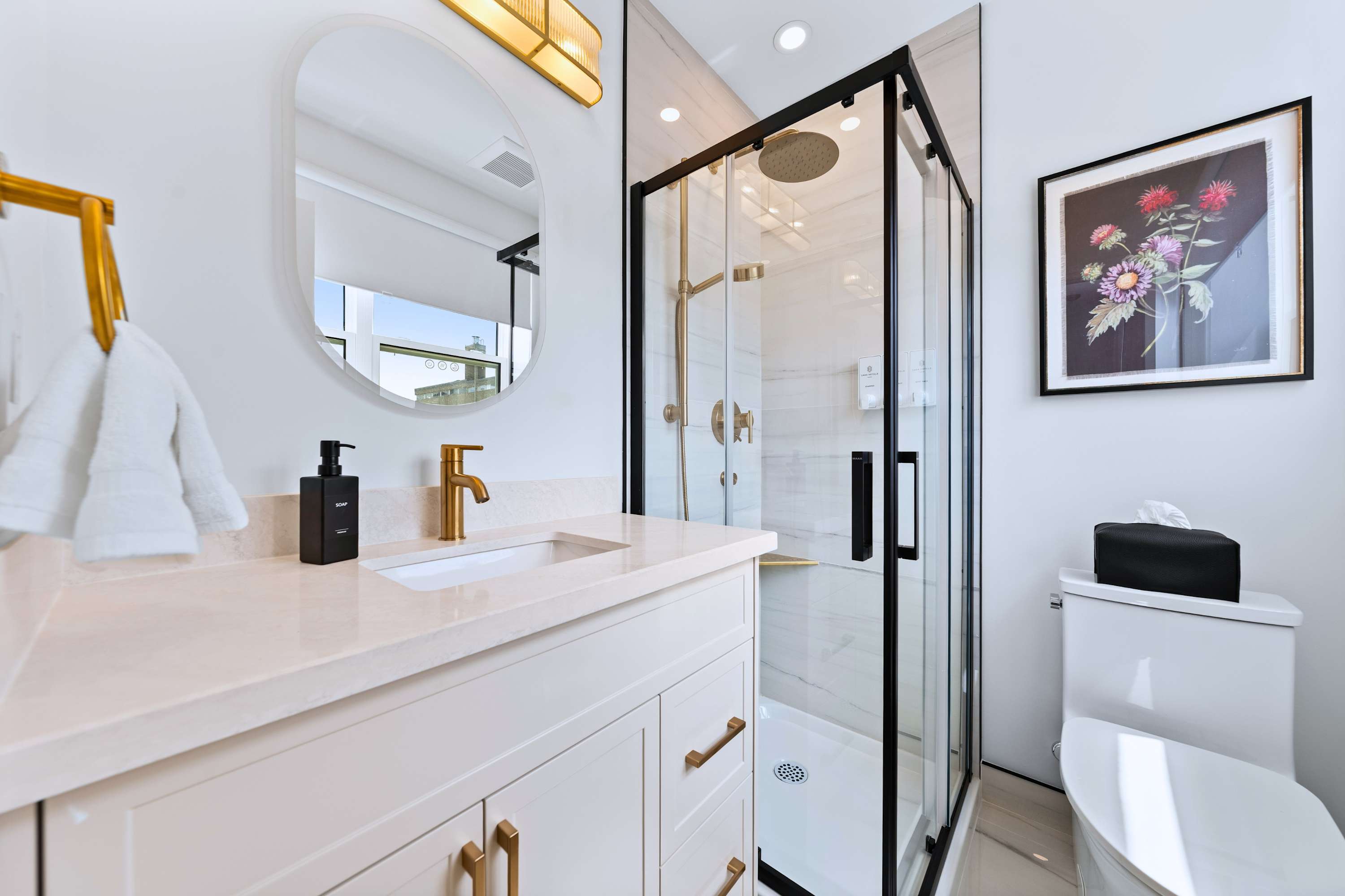 Modern bathroom featuring a sleek walk-in shower for refreshment.