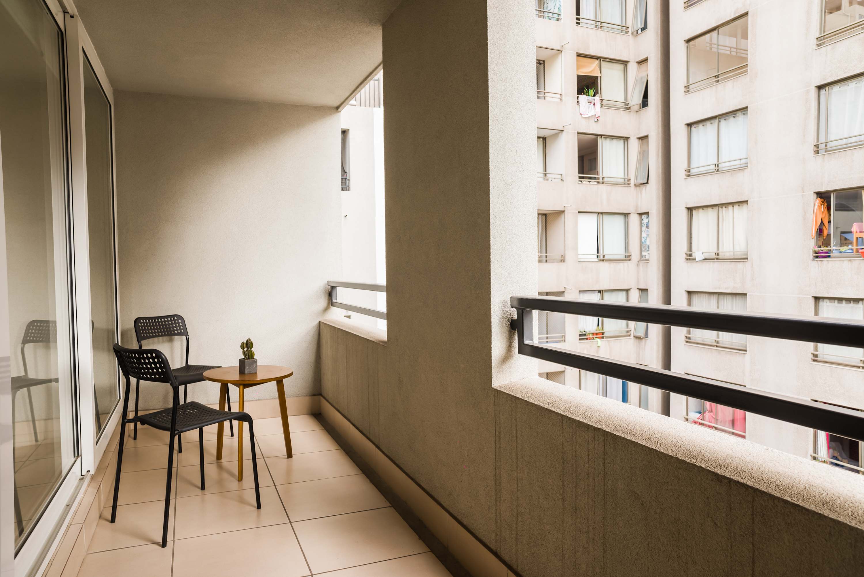 Santiago: 1BR Apartment with Balcony and Views