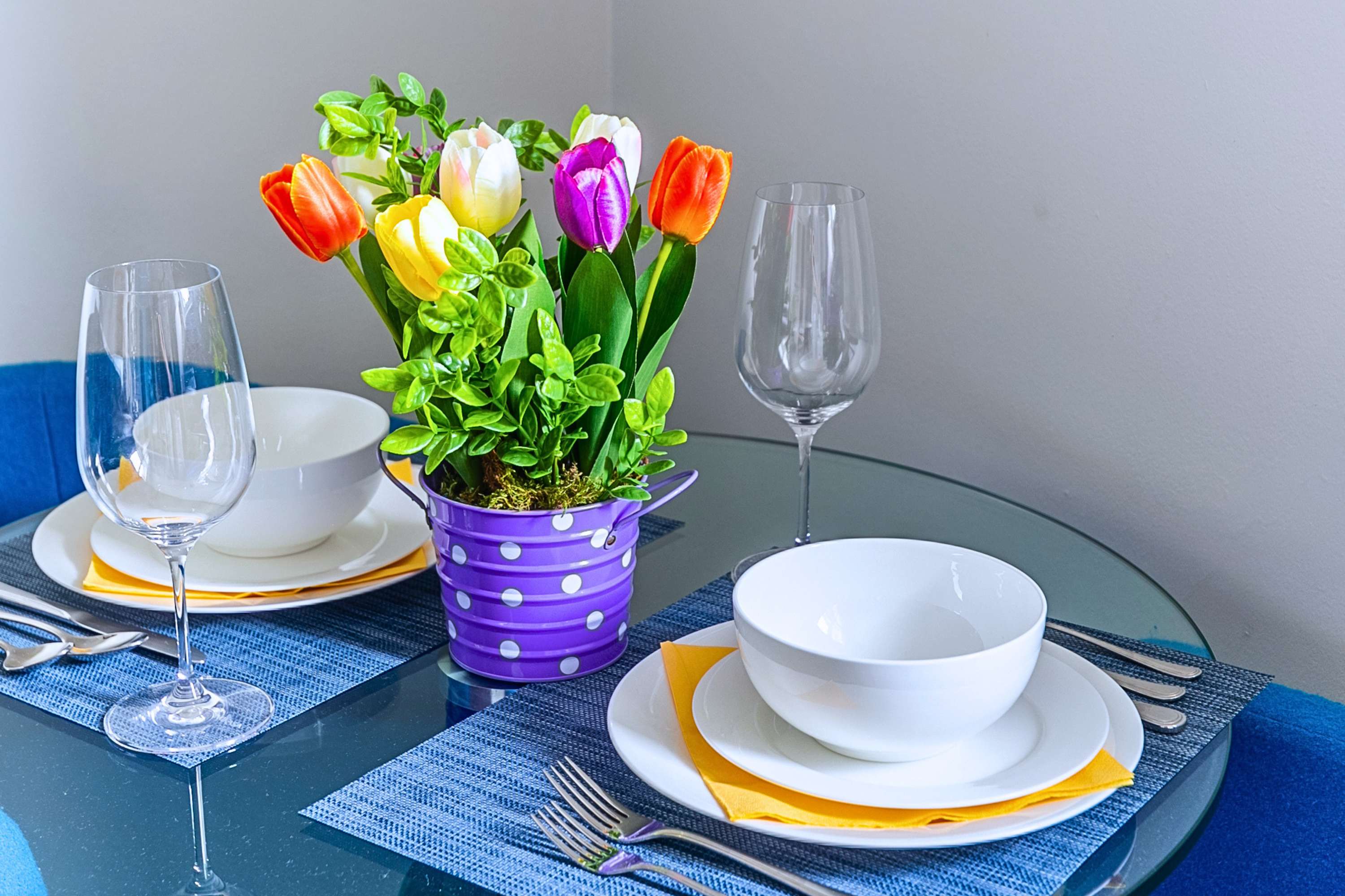 Dining setup with tulip centerpiece