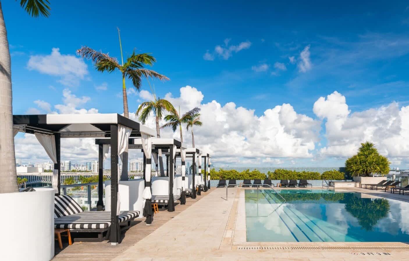 Ocean View Elegance | Rooftop Pool, Beach Access