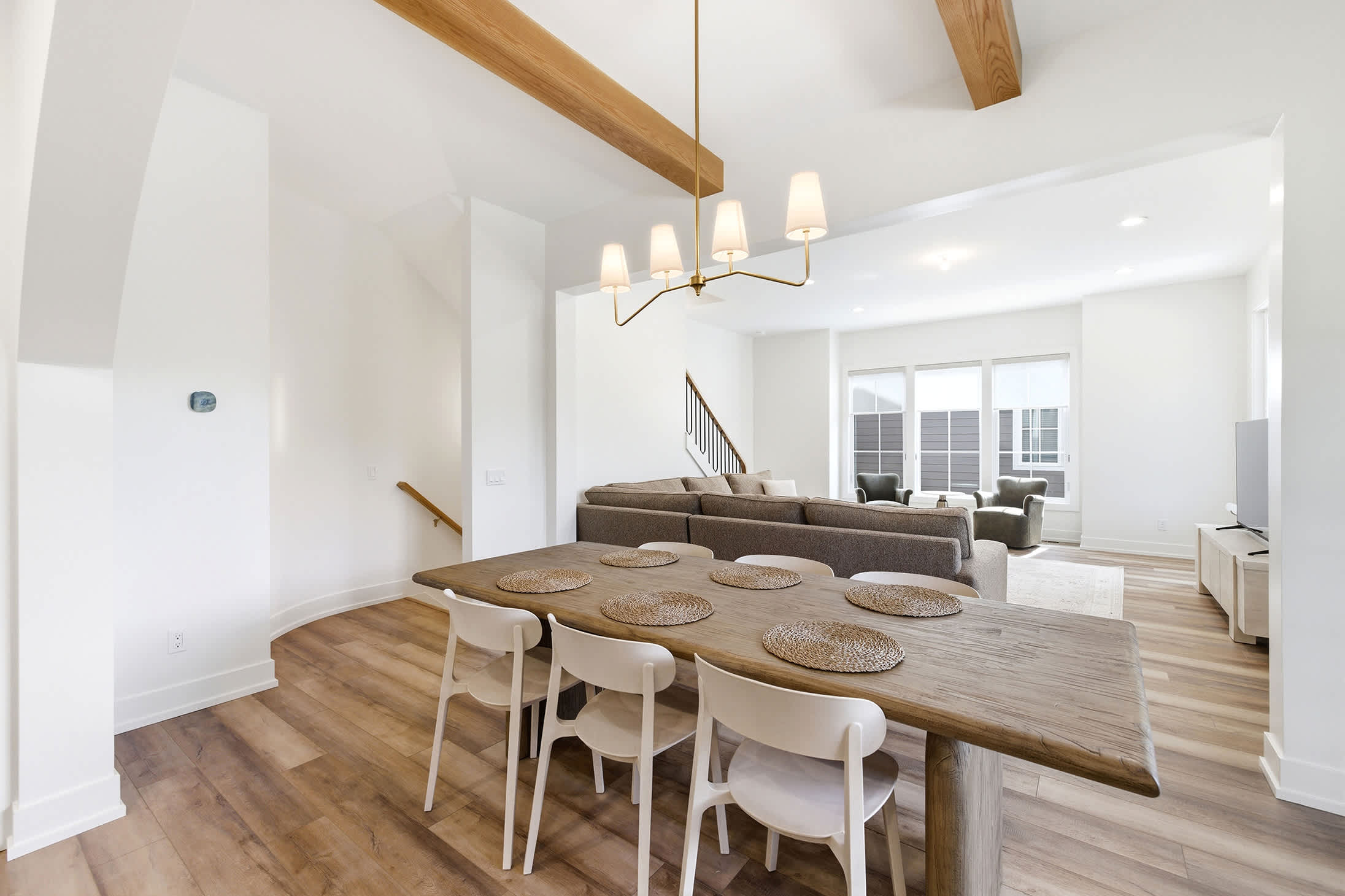 Gather the whole group under warm beams and brass light.