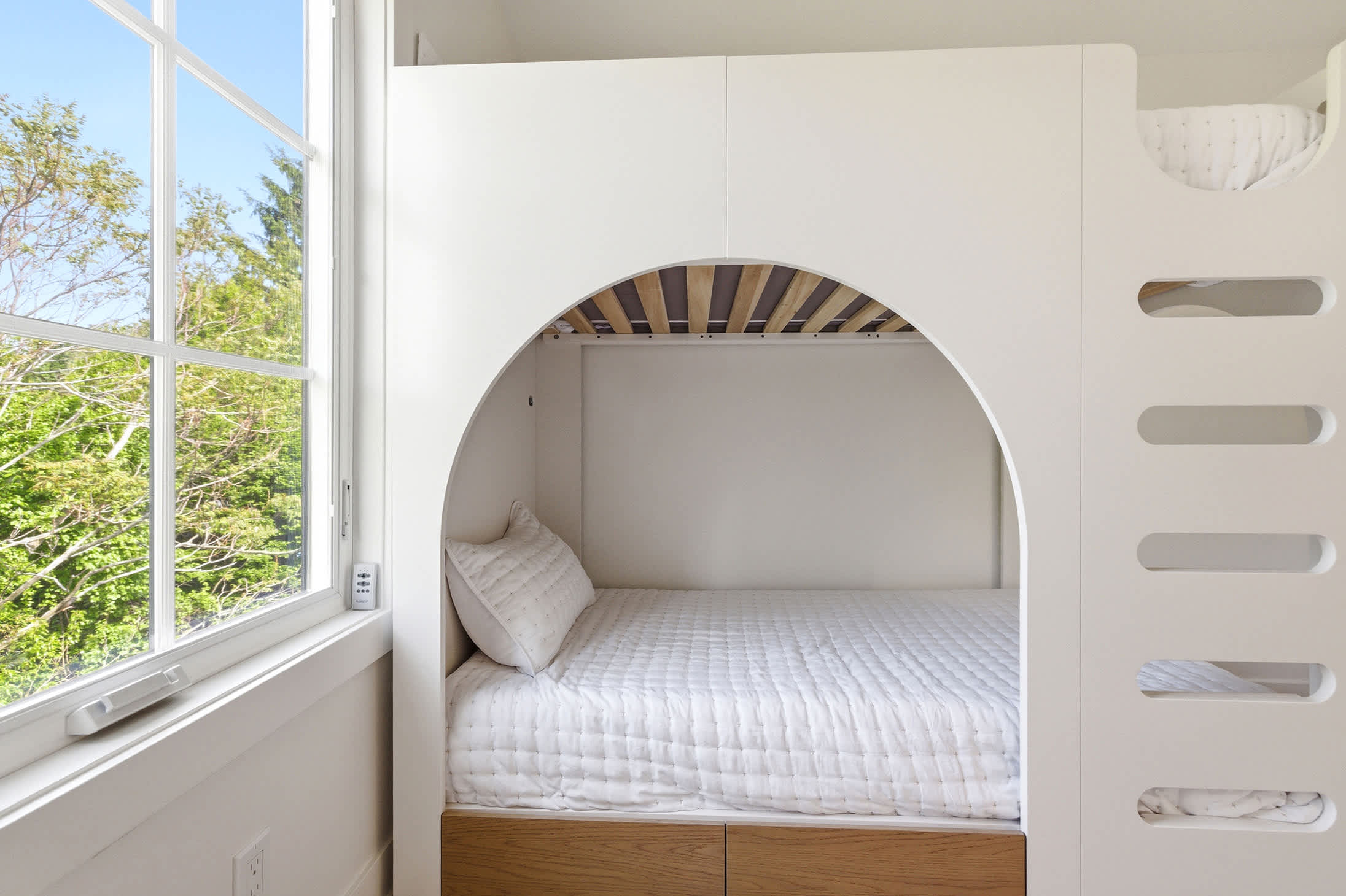 Bedroom 3 is on the upper level and has a single bunk bed.