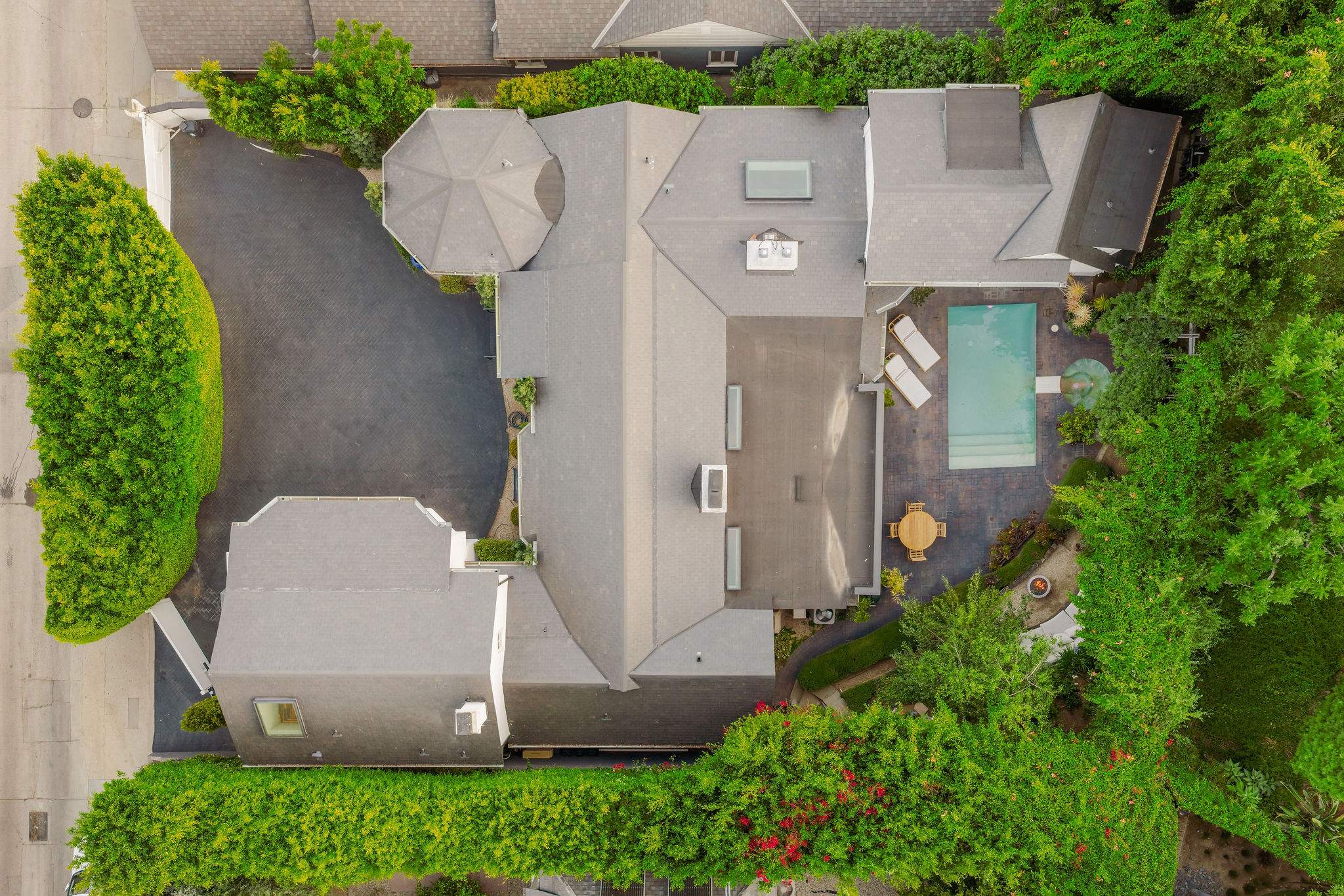 See how the estate is thoughtfully centered around its private courtyard and pool.