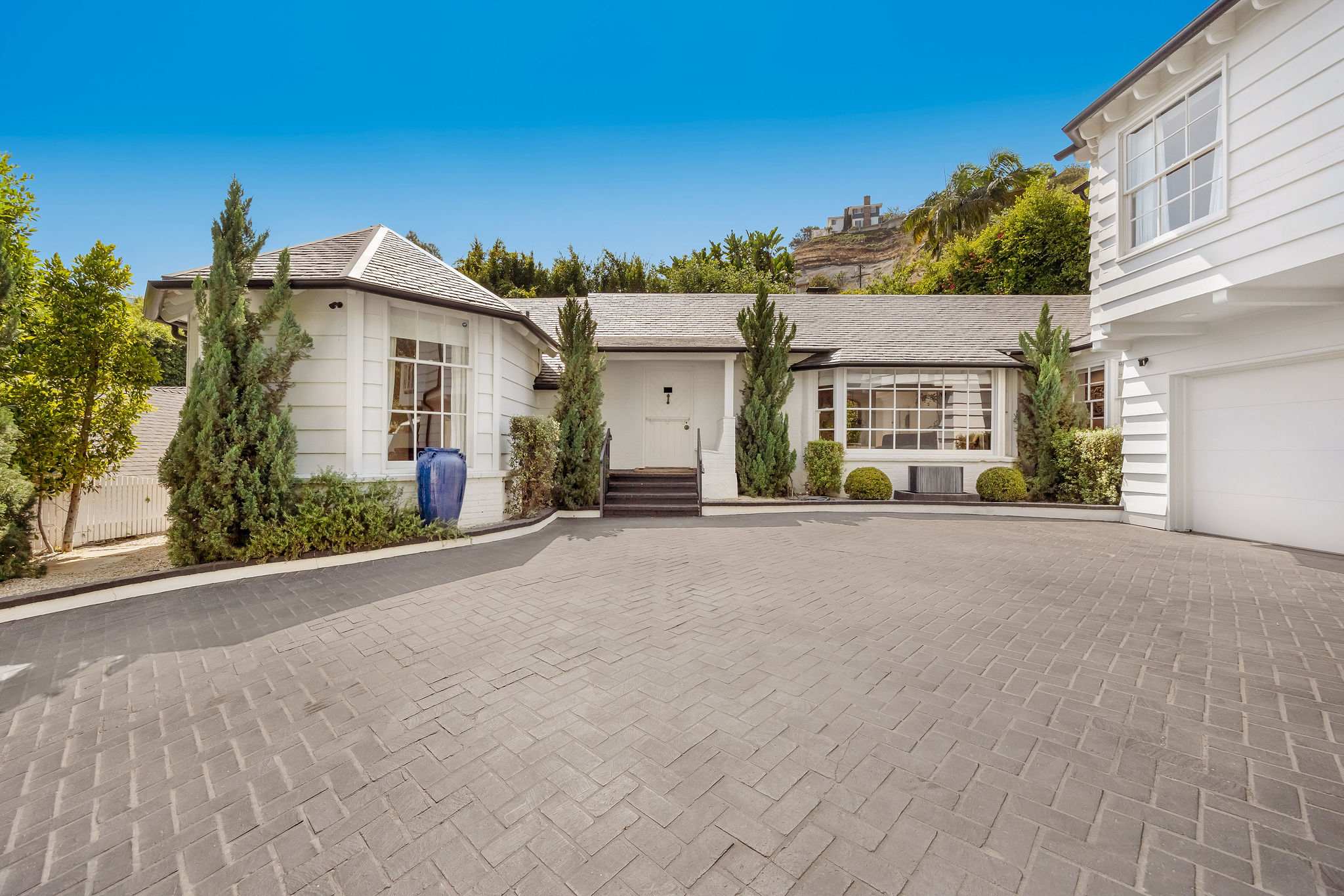 Enjoy the rare privacy of a gated compound hidden moments from the Sunset Strip.
