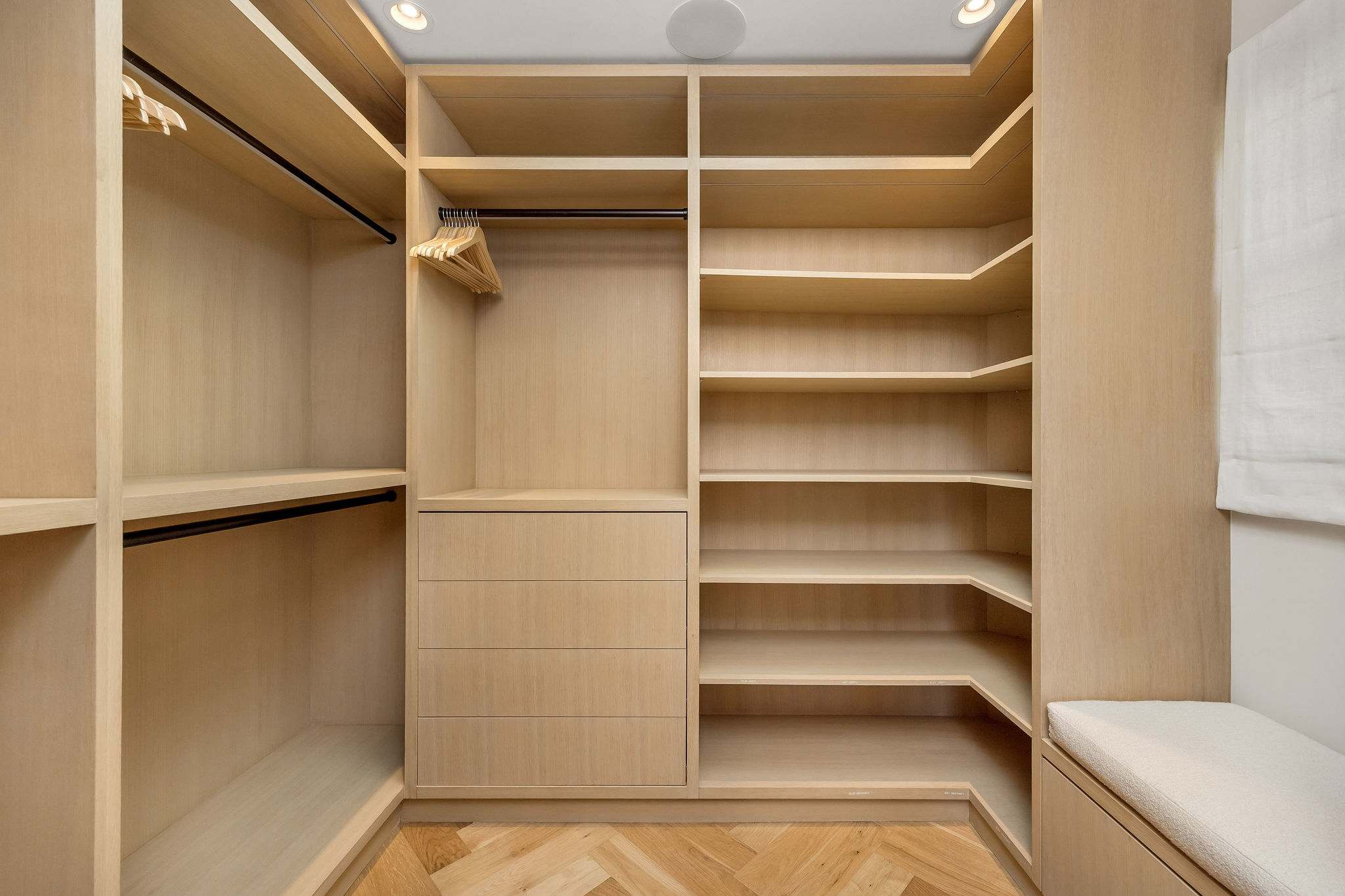 Settle into a custom walk-in closet worthy of an extended stay.