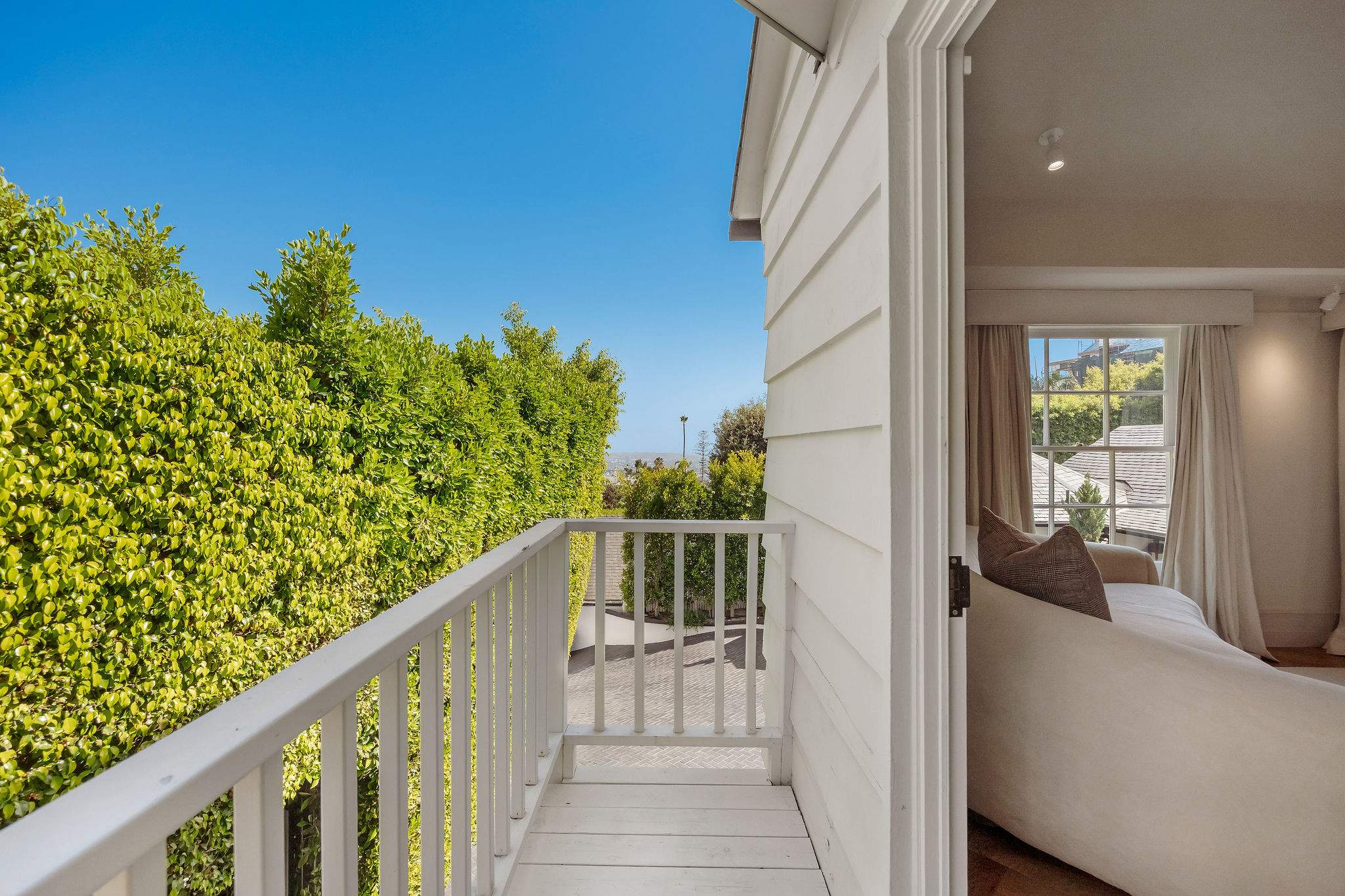 Step onto your private balcony and enjoy peaceful courtyard views.