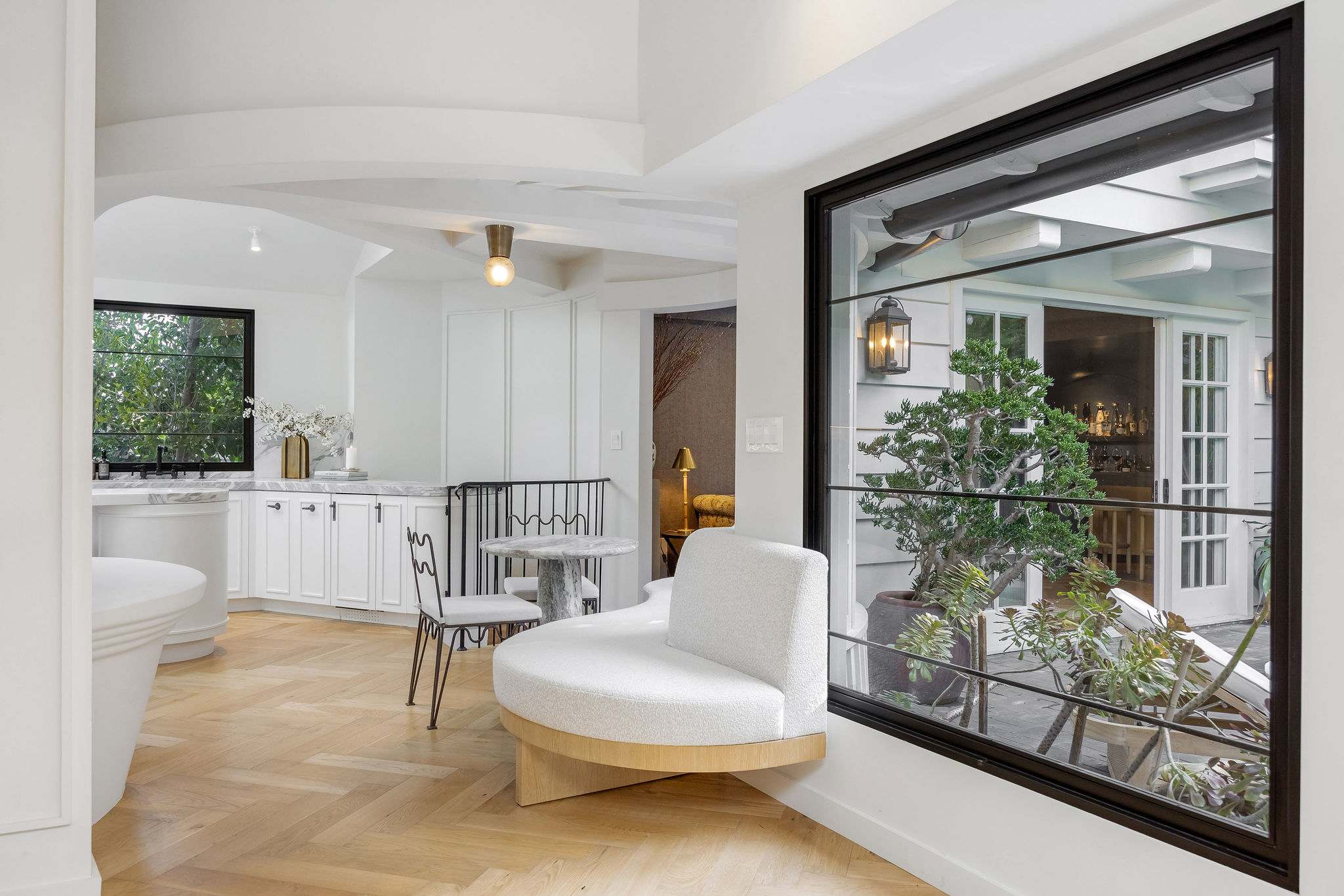 Enjoy seamless indoor-outdoor living with tranquil courtyard views.