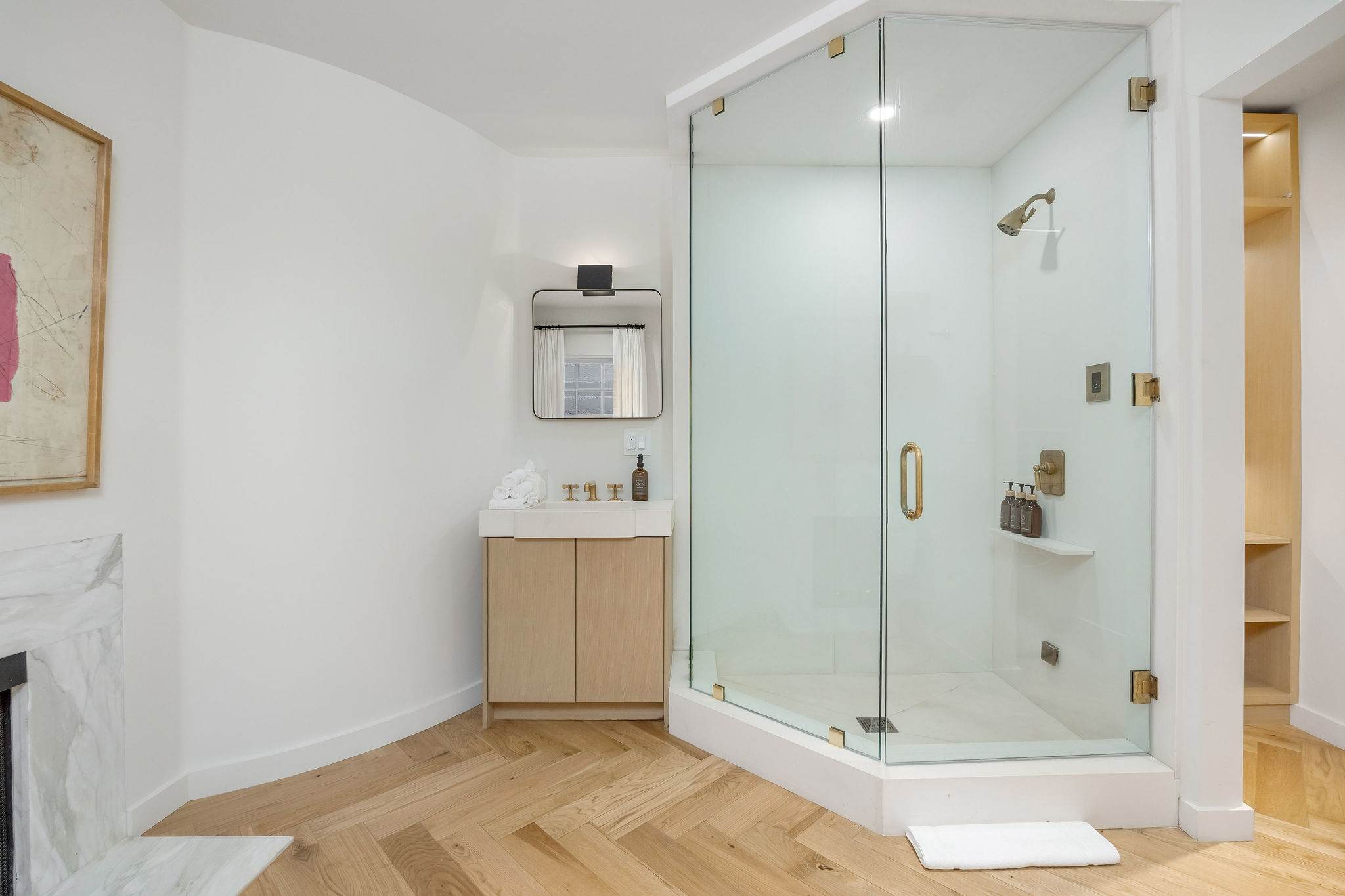 Take your time getting ready in a bright space finished with elegant details.