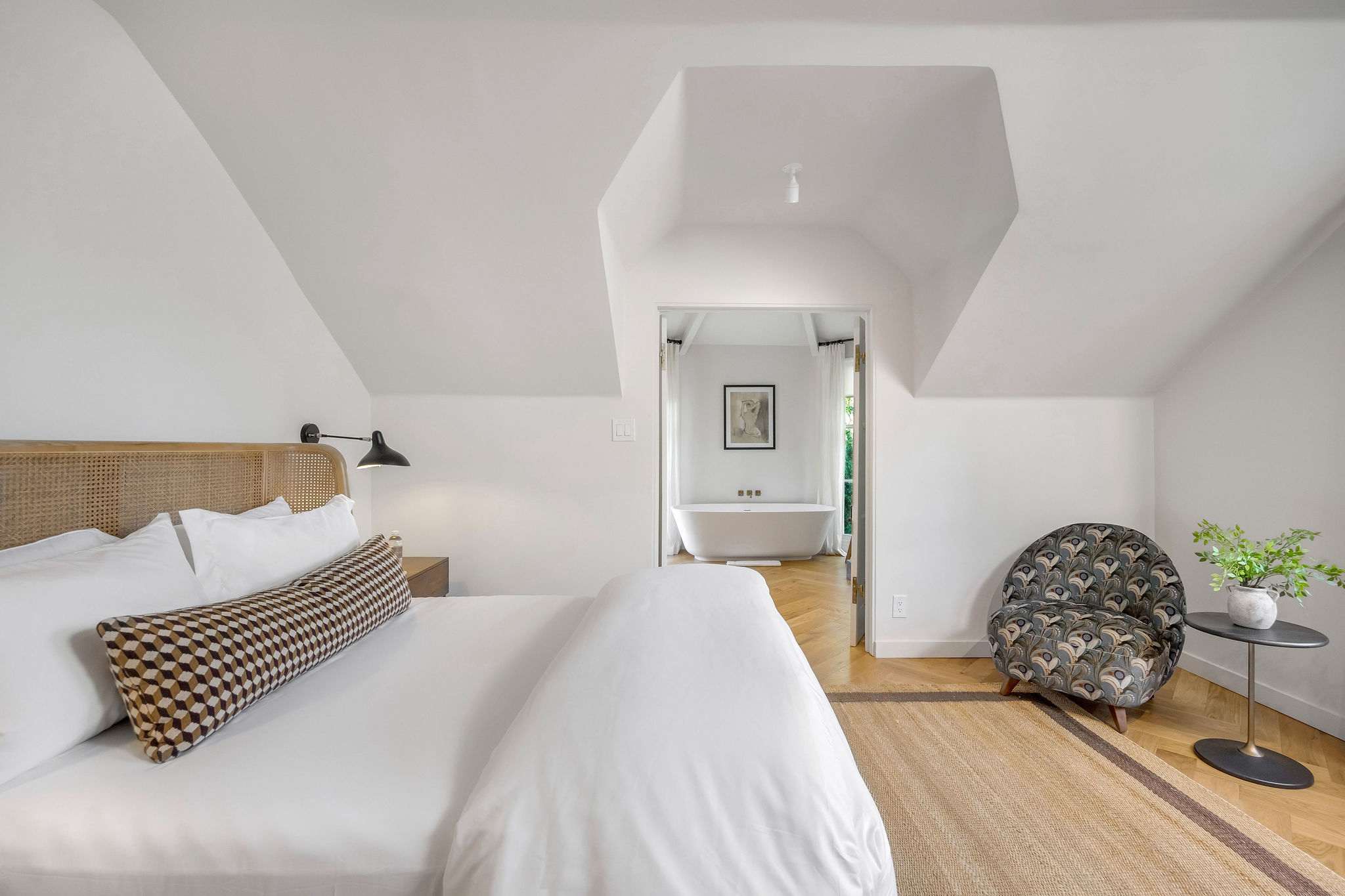 Wake up beneath vaulted ceilings and ease into the day at your own pace.