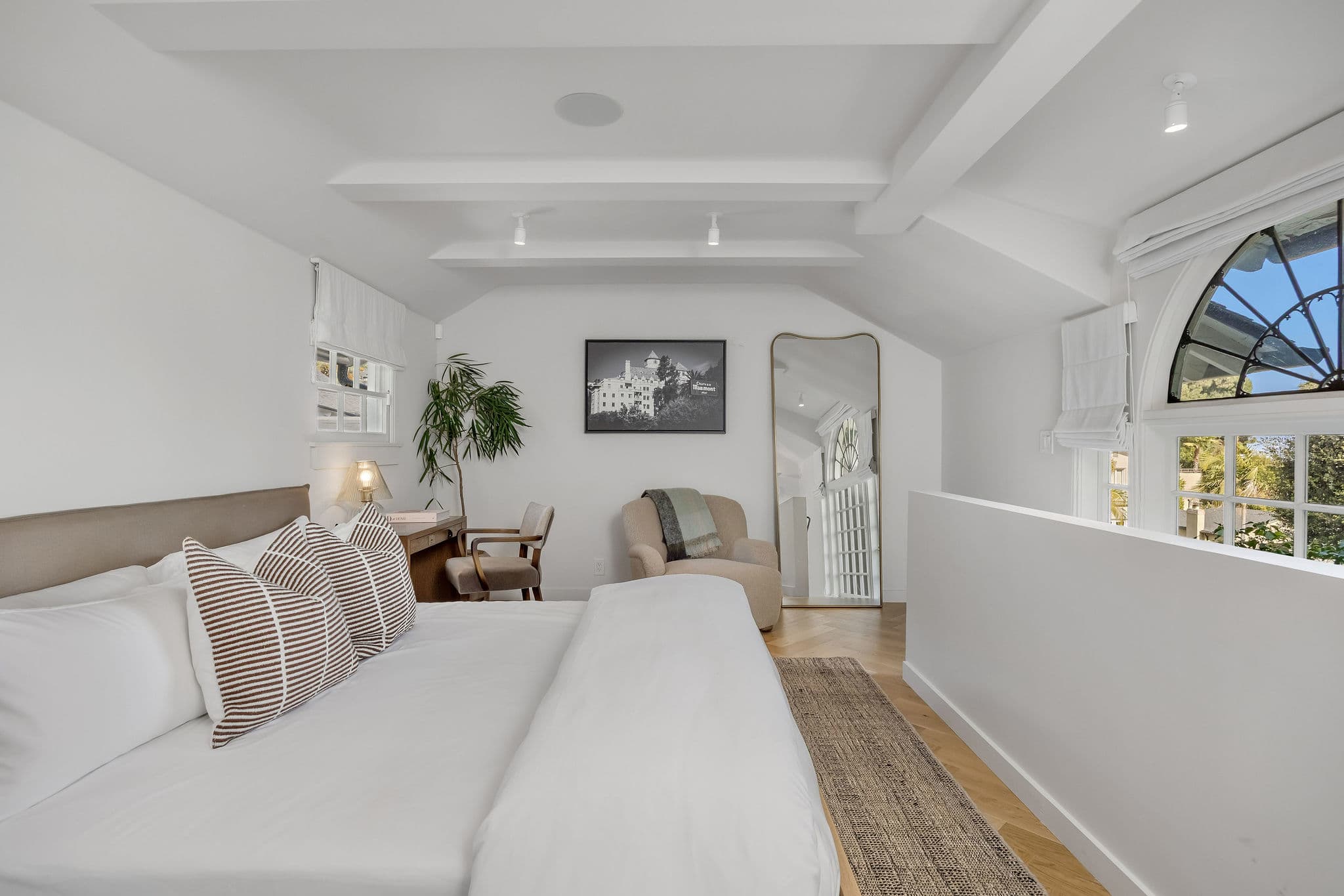 Stretch out in a sun-filled suite with charming architectural details.