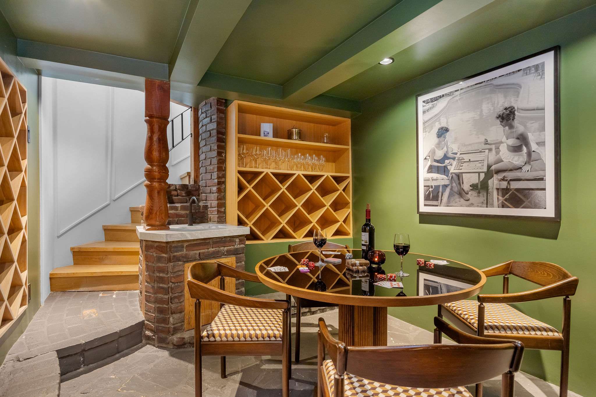 Descend into your hidden wine cellar and tasting room for unforgettable evenings.