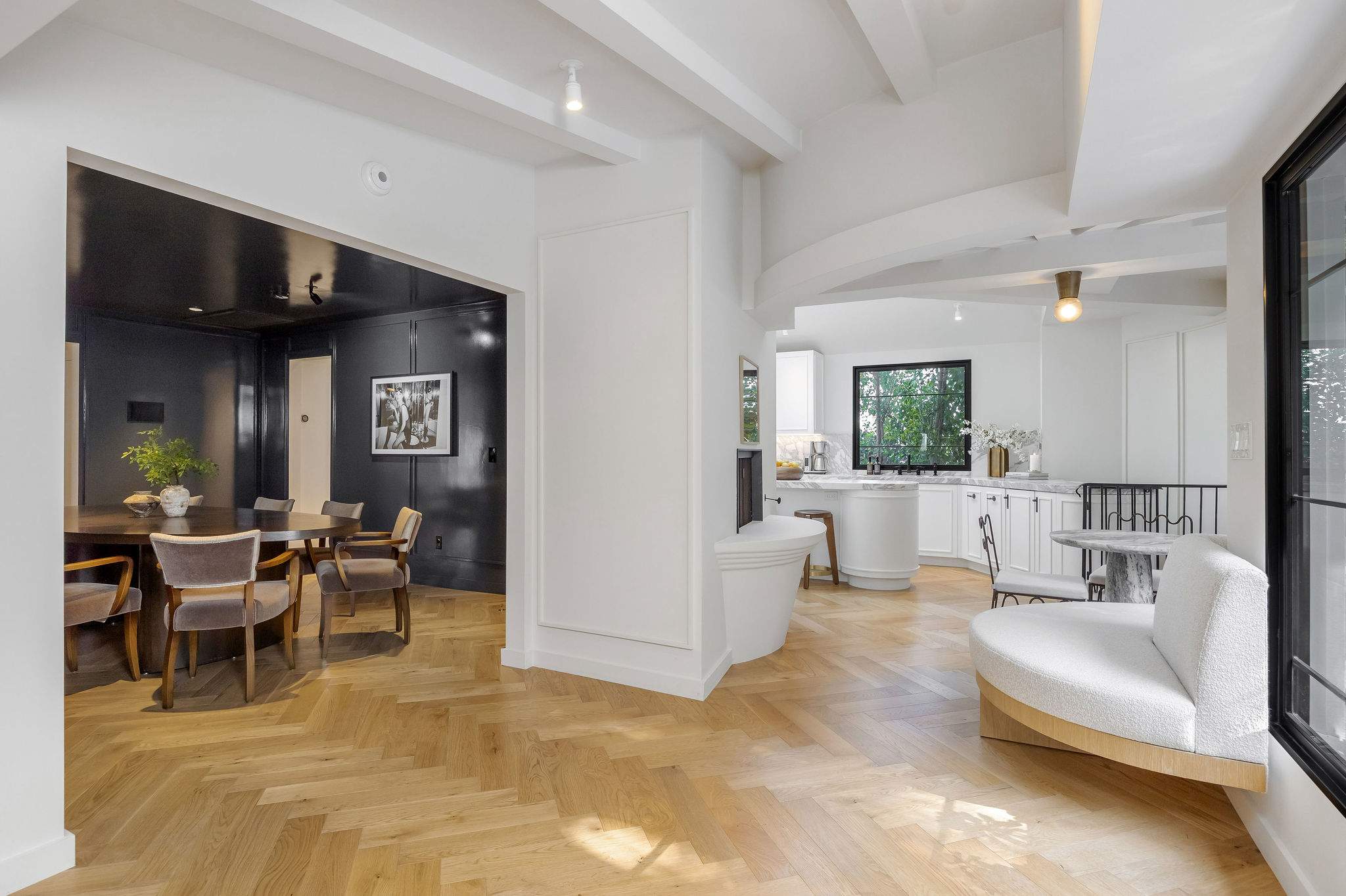 Enjoy seamless flow between the living room, dining area, and wine lounge.