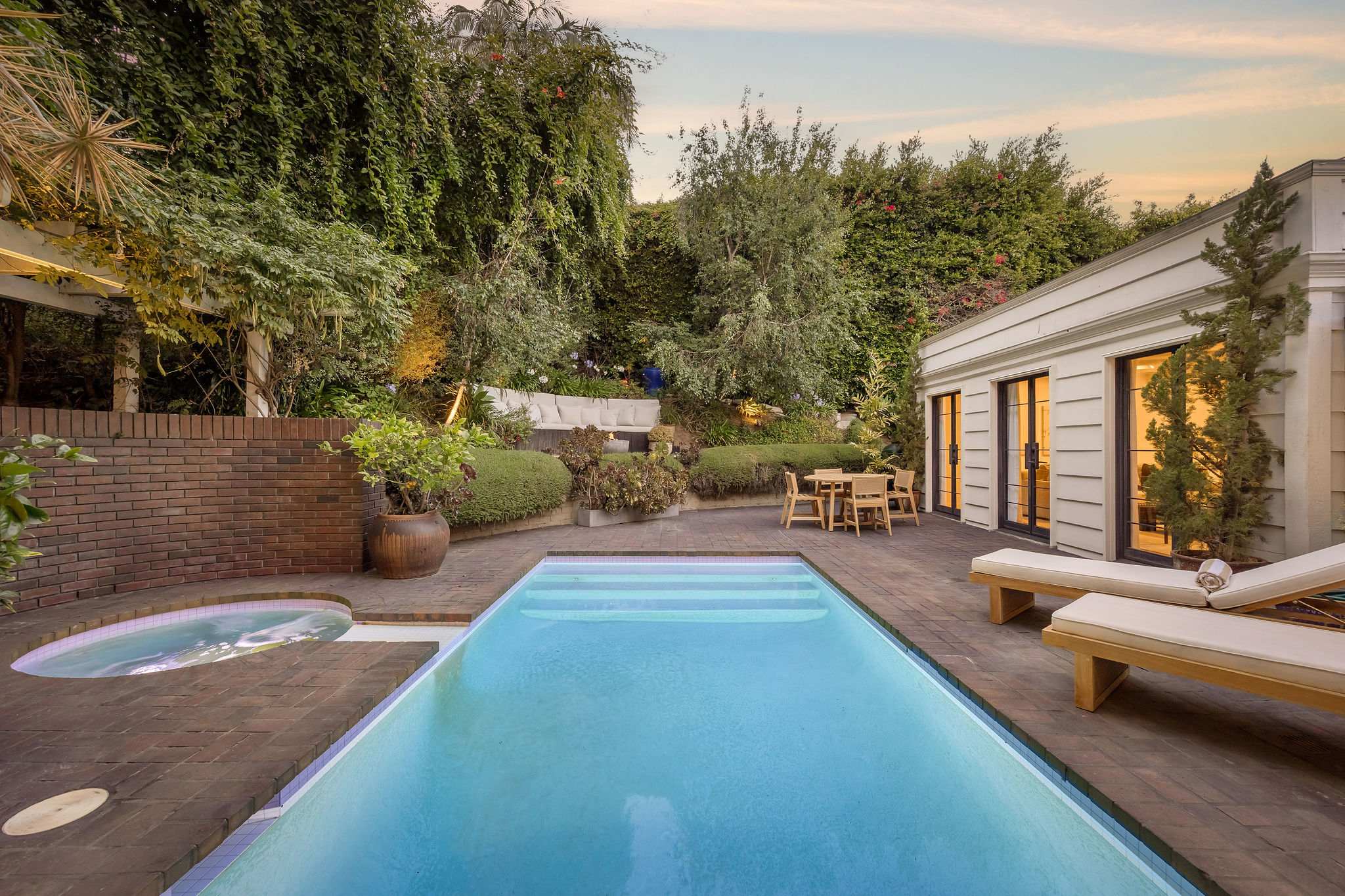 Cool off in your secluded pool surrounded by lush landscaping.