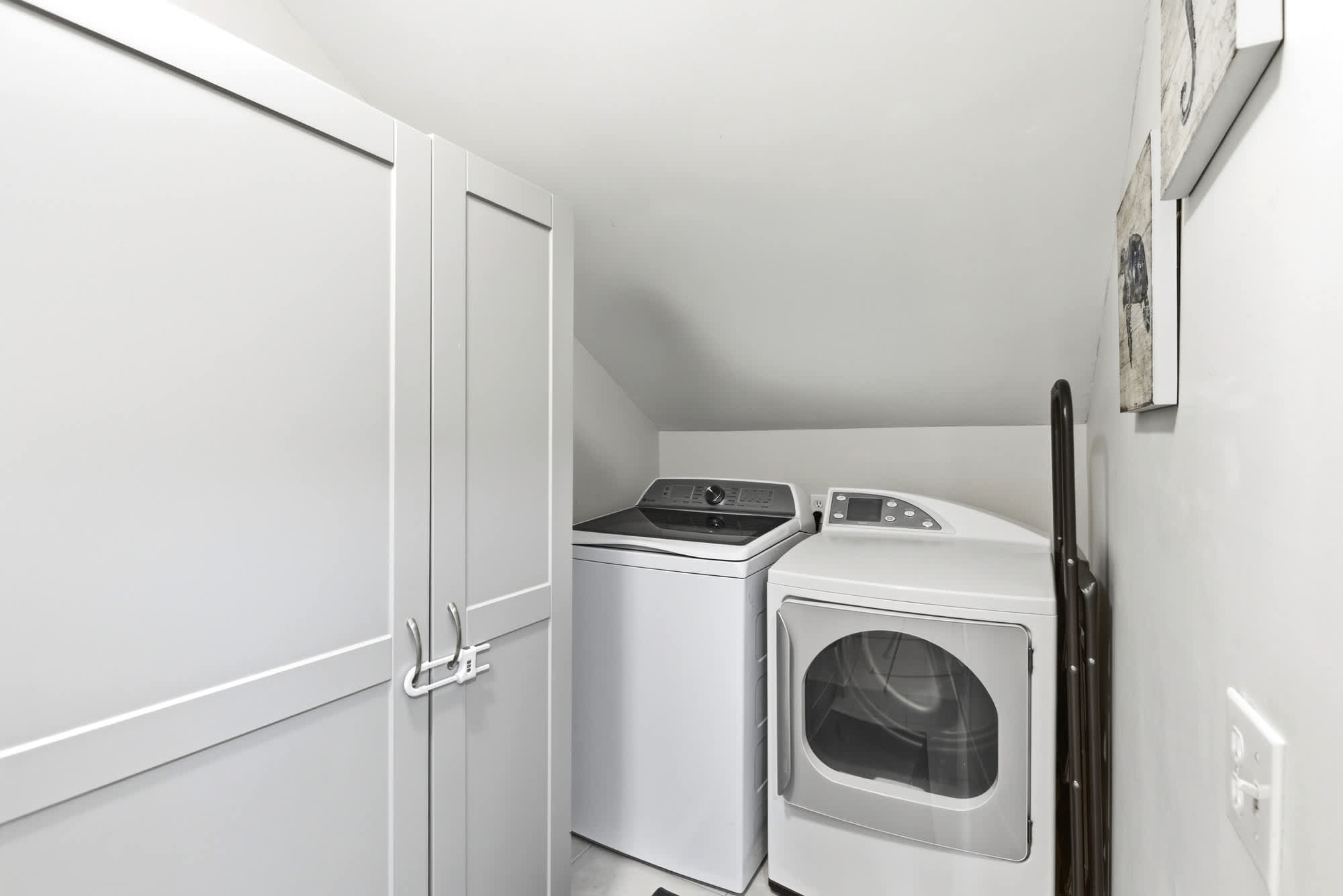 Full-size side-by-side washer and dryer with ample built-in storage make extended stays effortless.