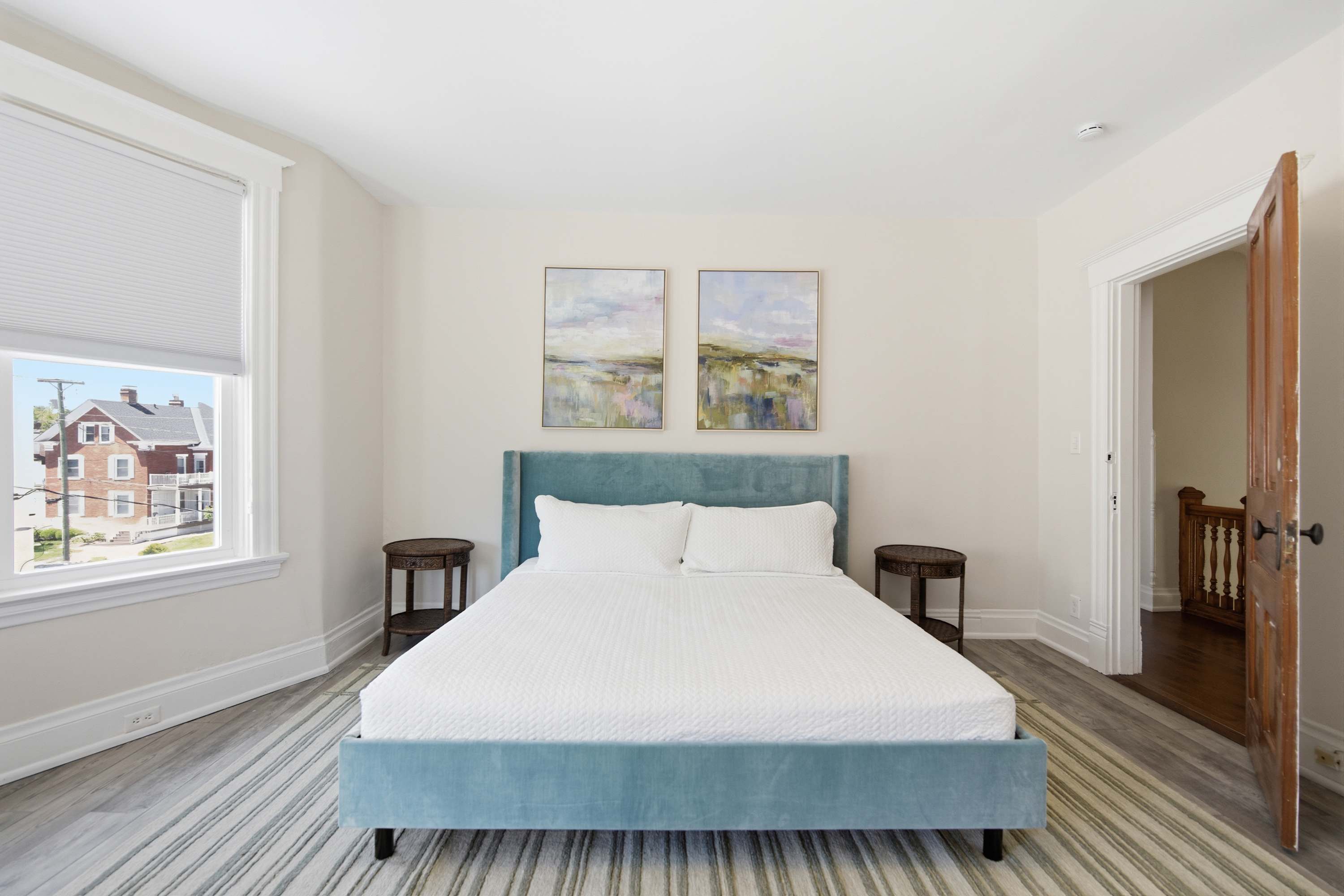 The primary suite boasts a plush king bed & an ensuite bath​