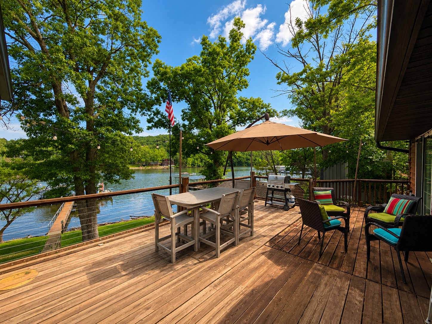 Lounge the day away or dine alfresco with lake views on the deck​