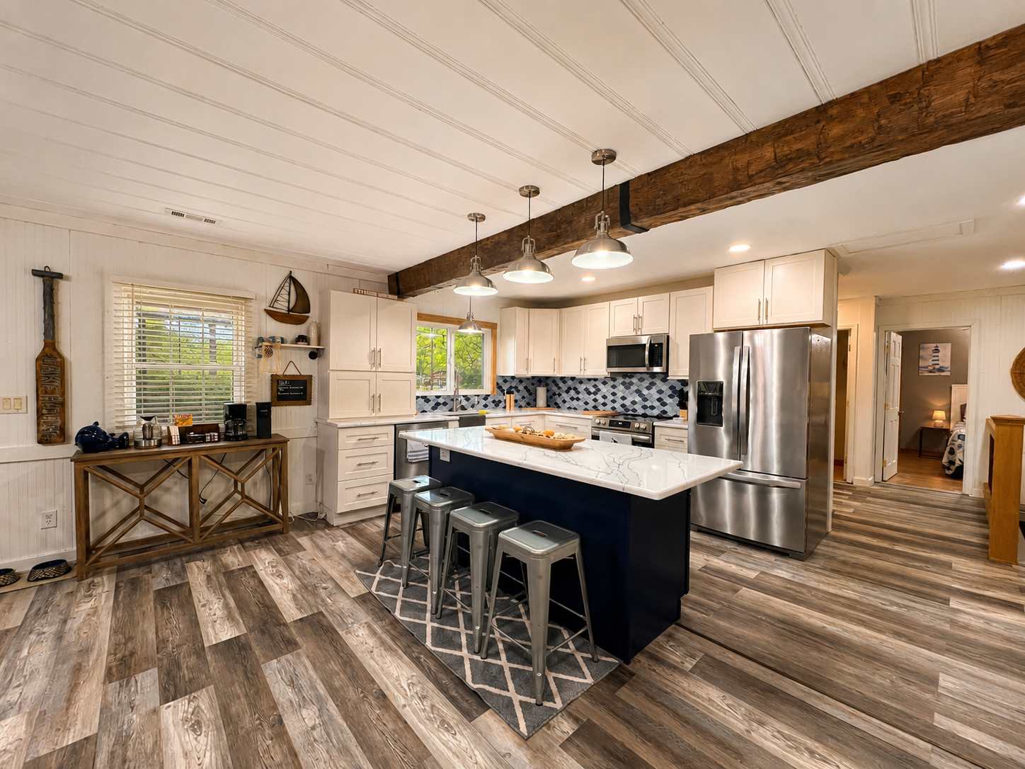 The airy, open kitchen is well equipped for an unforgettable getaway​