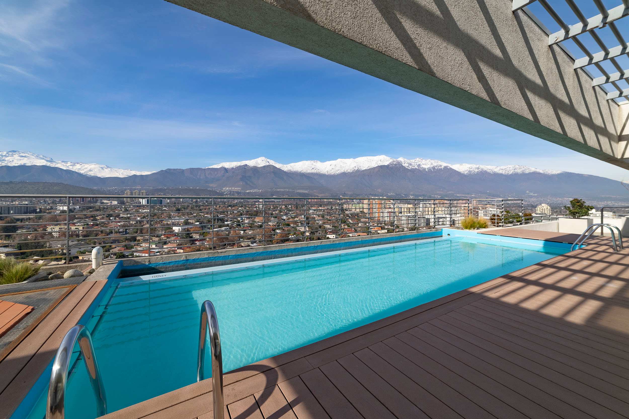 Enjoy breathtaking mountain views from the rooftop pool, perfect for a relaxing swim.