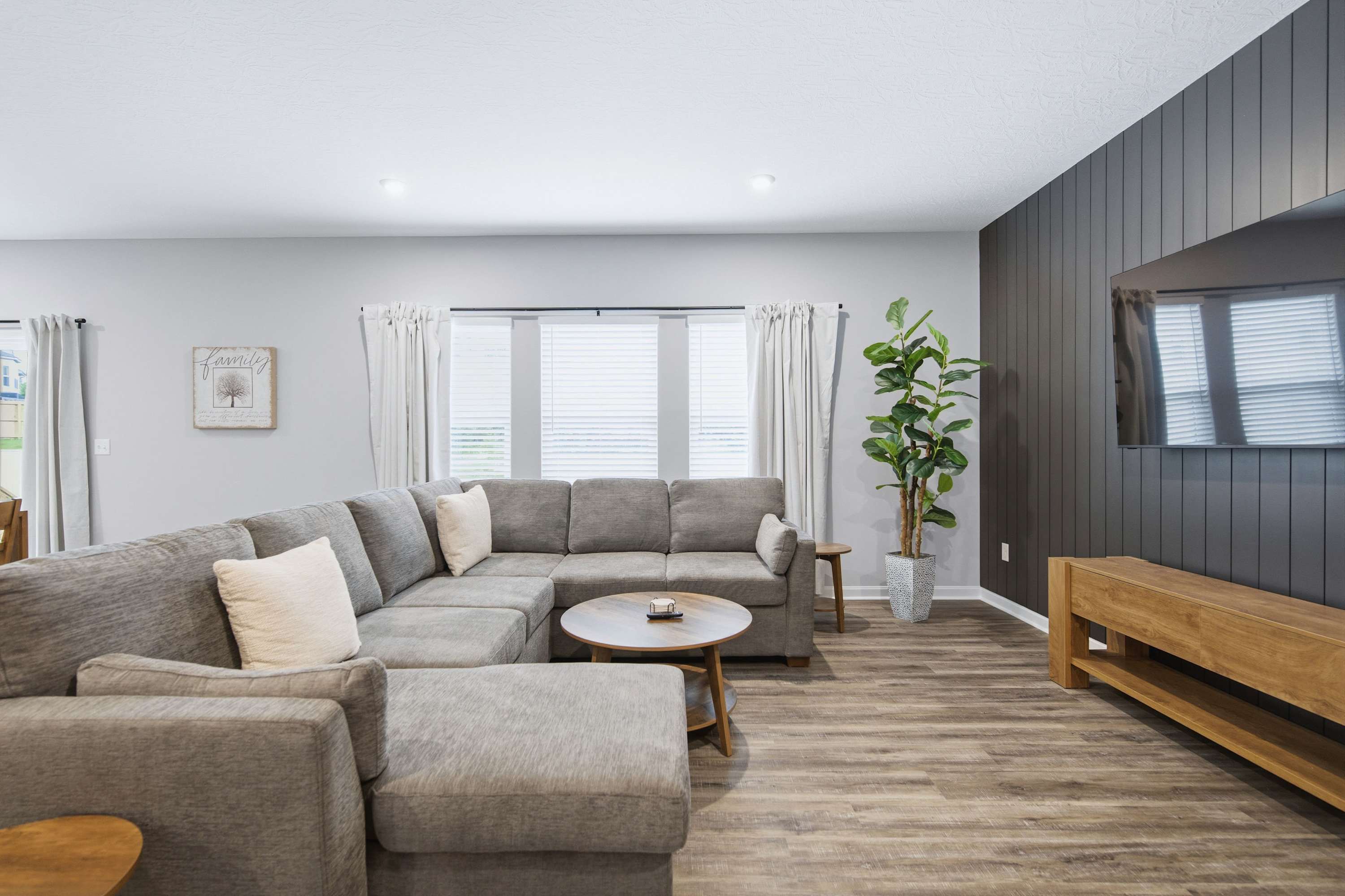 Curl up in the chic living room & stream your favorites on the smart TV​