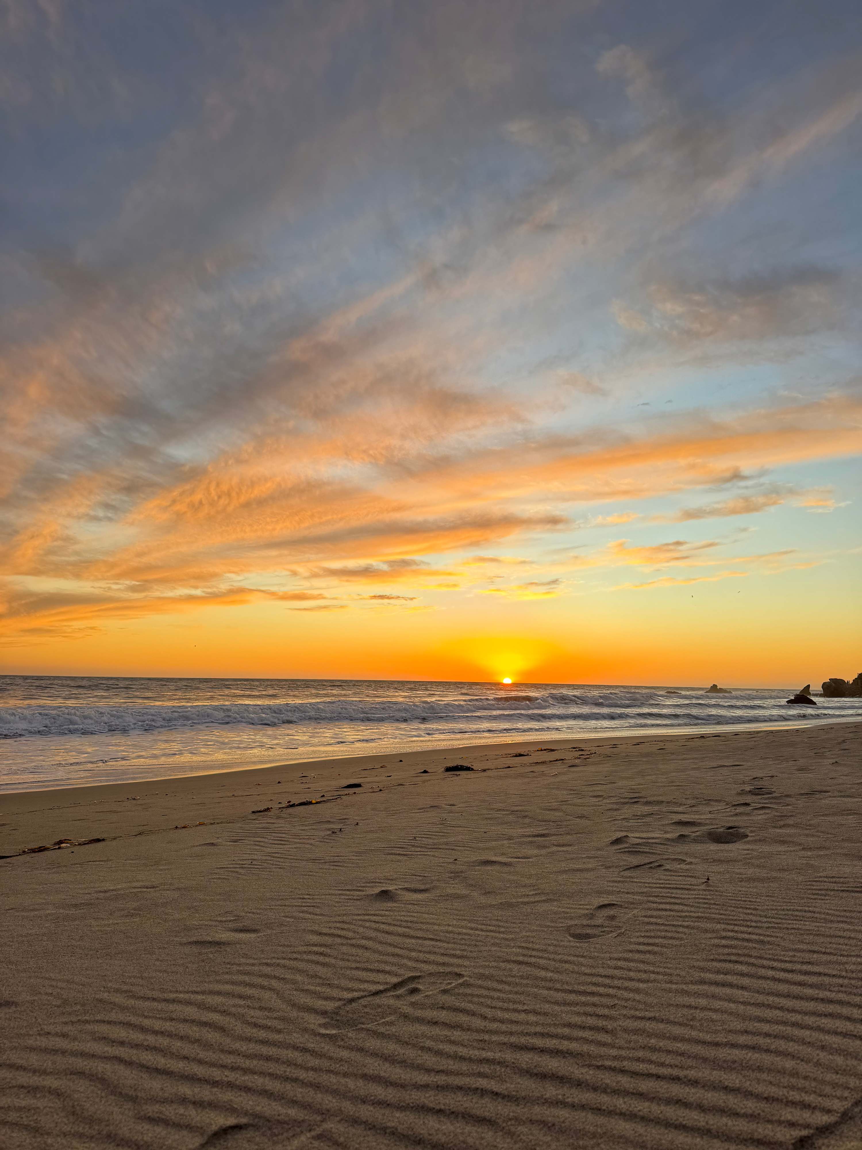 Golden hour arrives differently on Carbon Beach.