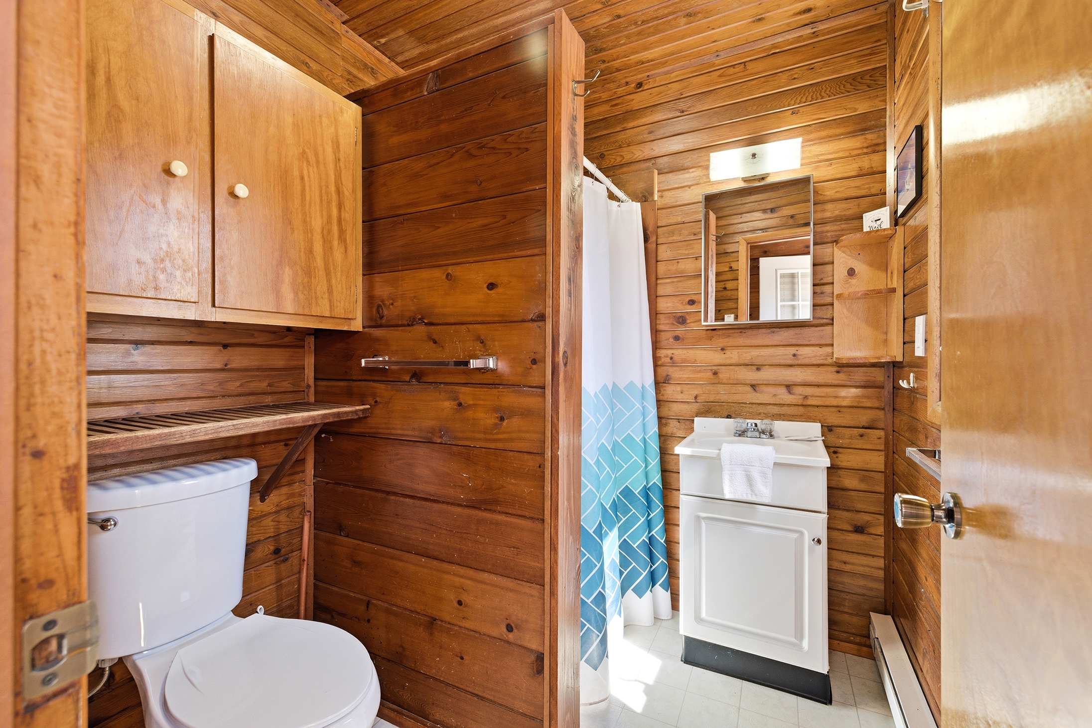 Main-level bath with a walk-in shower right where you need it most.