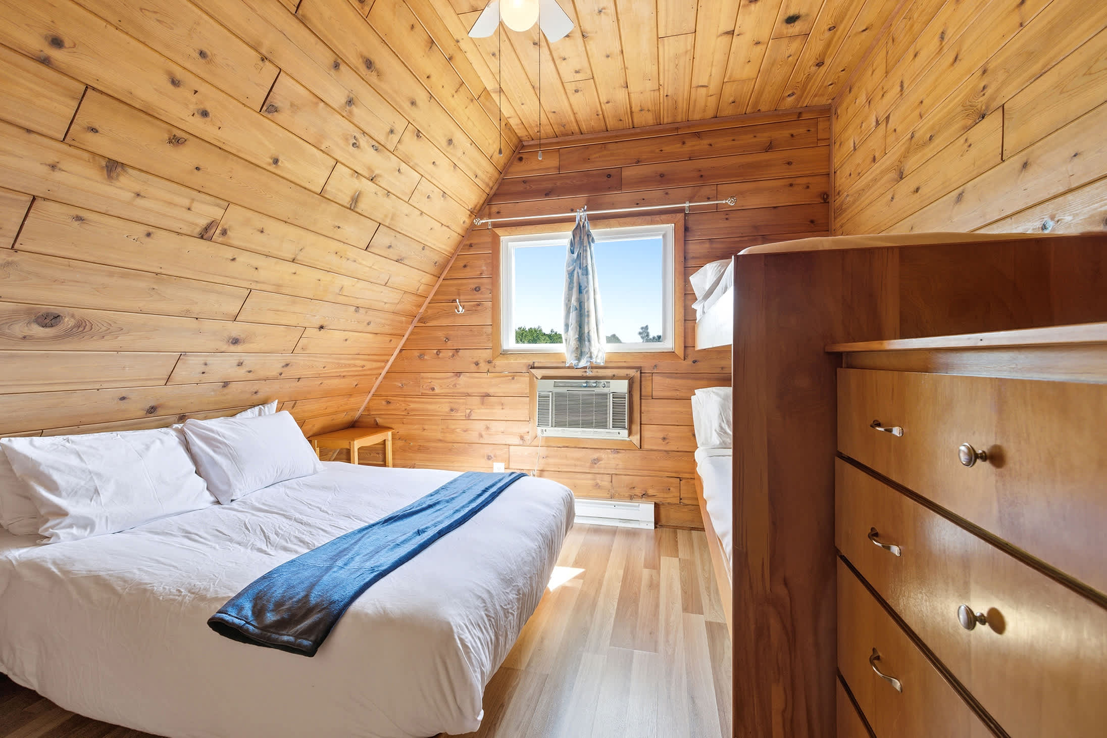 The kind of room where vacation stories are shared before lights out.