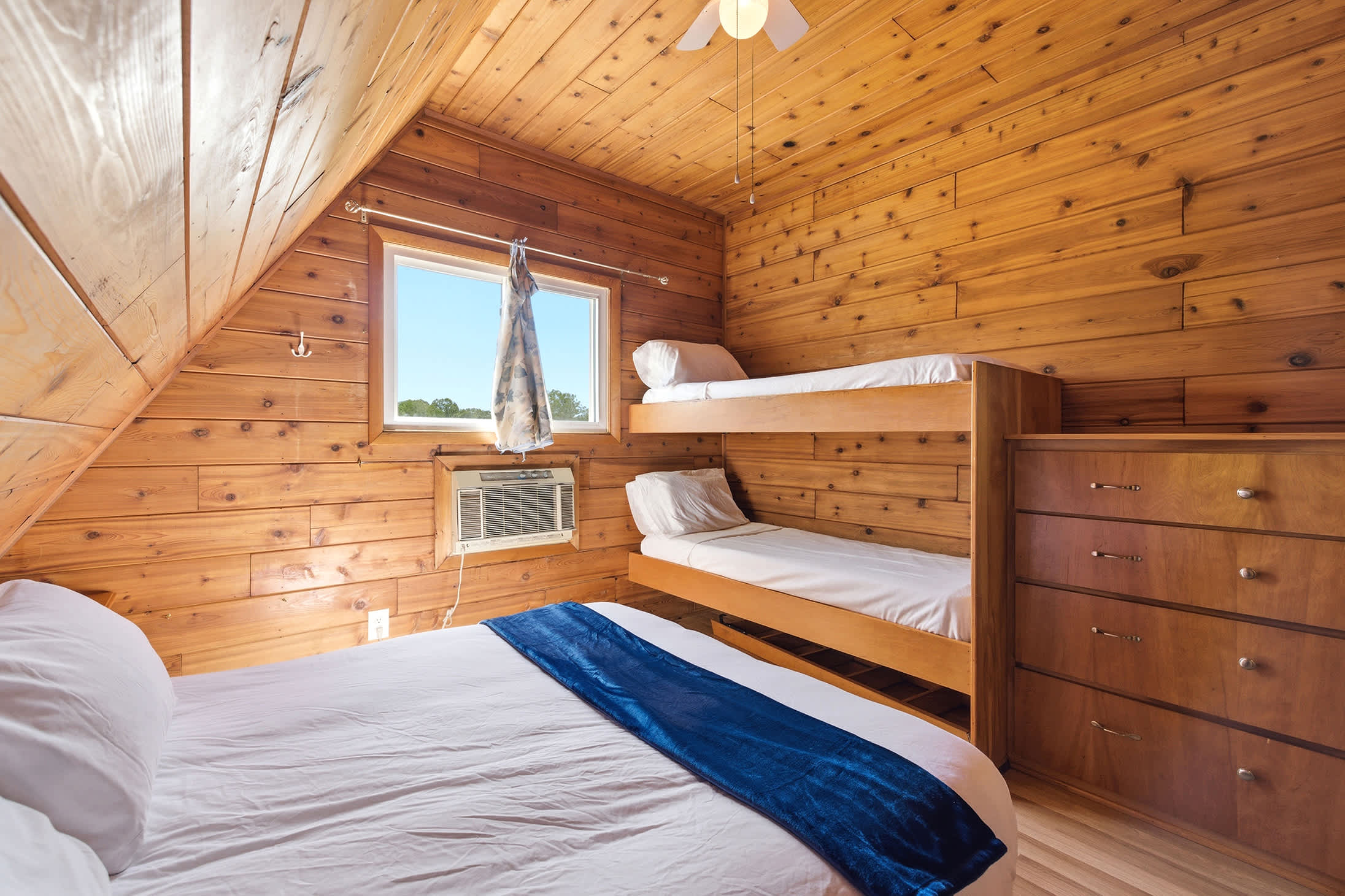Bedroom 2 is on the 2nd floor and has a queen and single bunk bed.