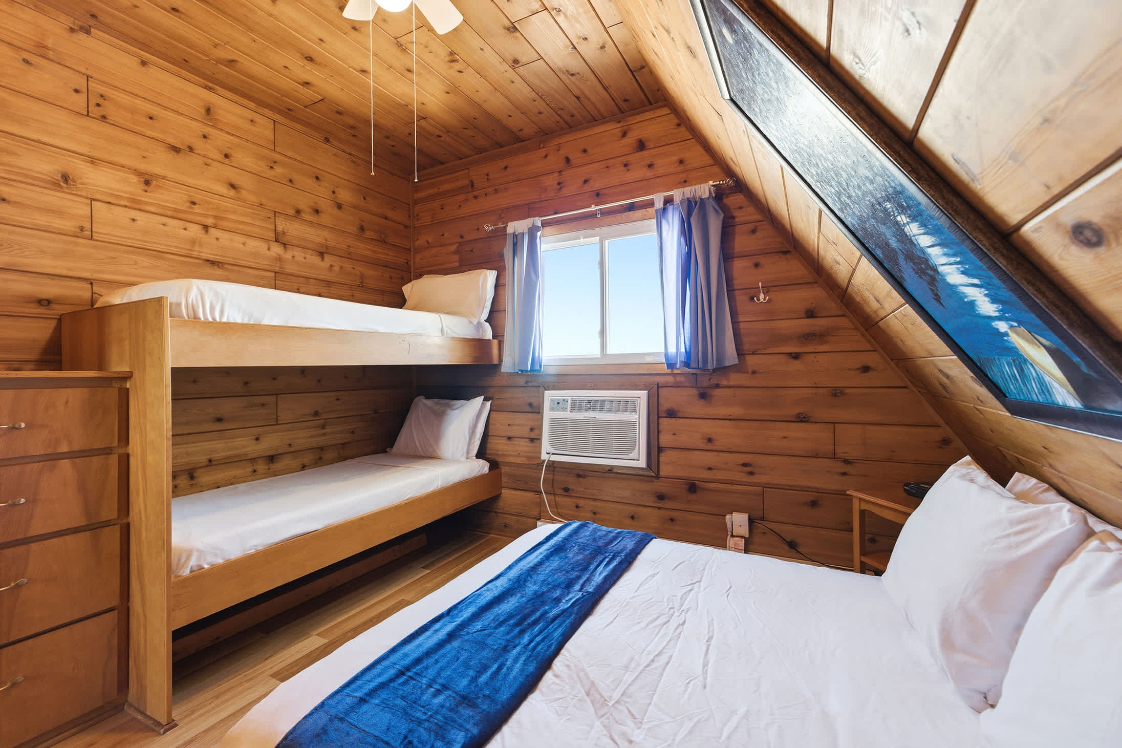 Bedroom 1 is on the 2nd floor and has a queen and single bunk bed.