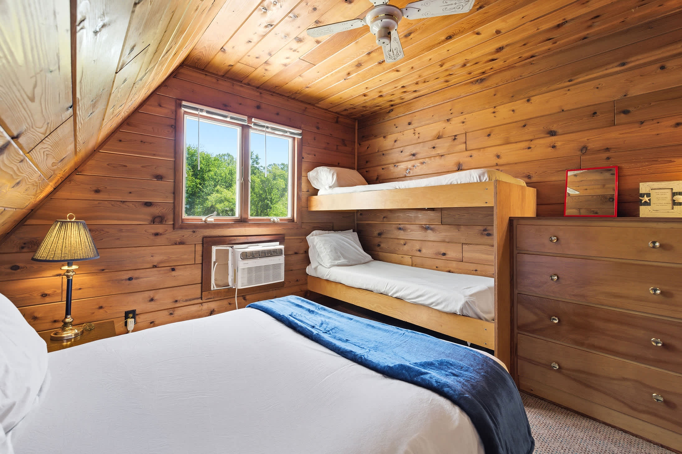 Bedroom 2 is on the 2nd floor and has a queen and single bunk bed.