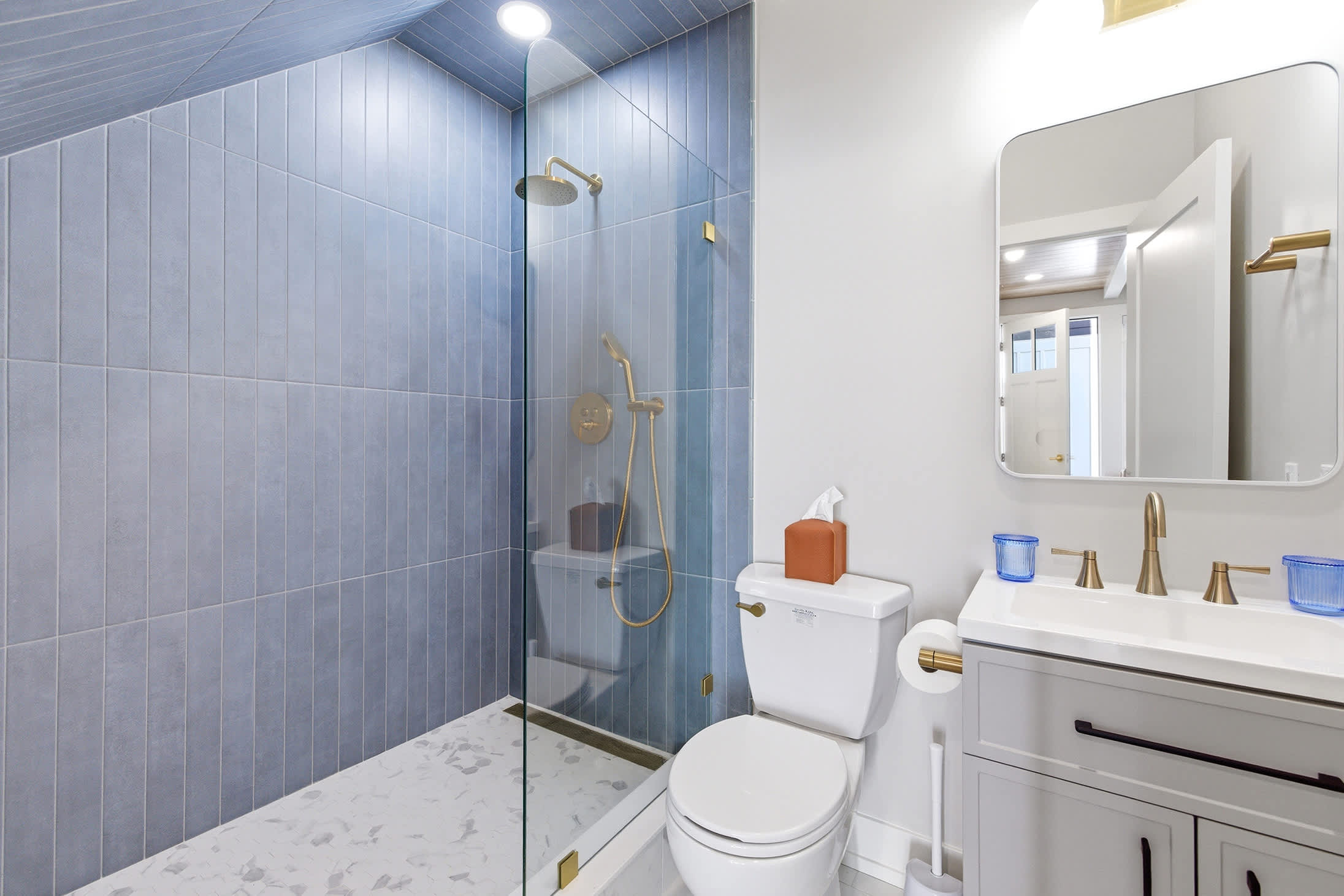 Easy rinse off after Lake Michigan beach days in the first floor bathroom.